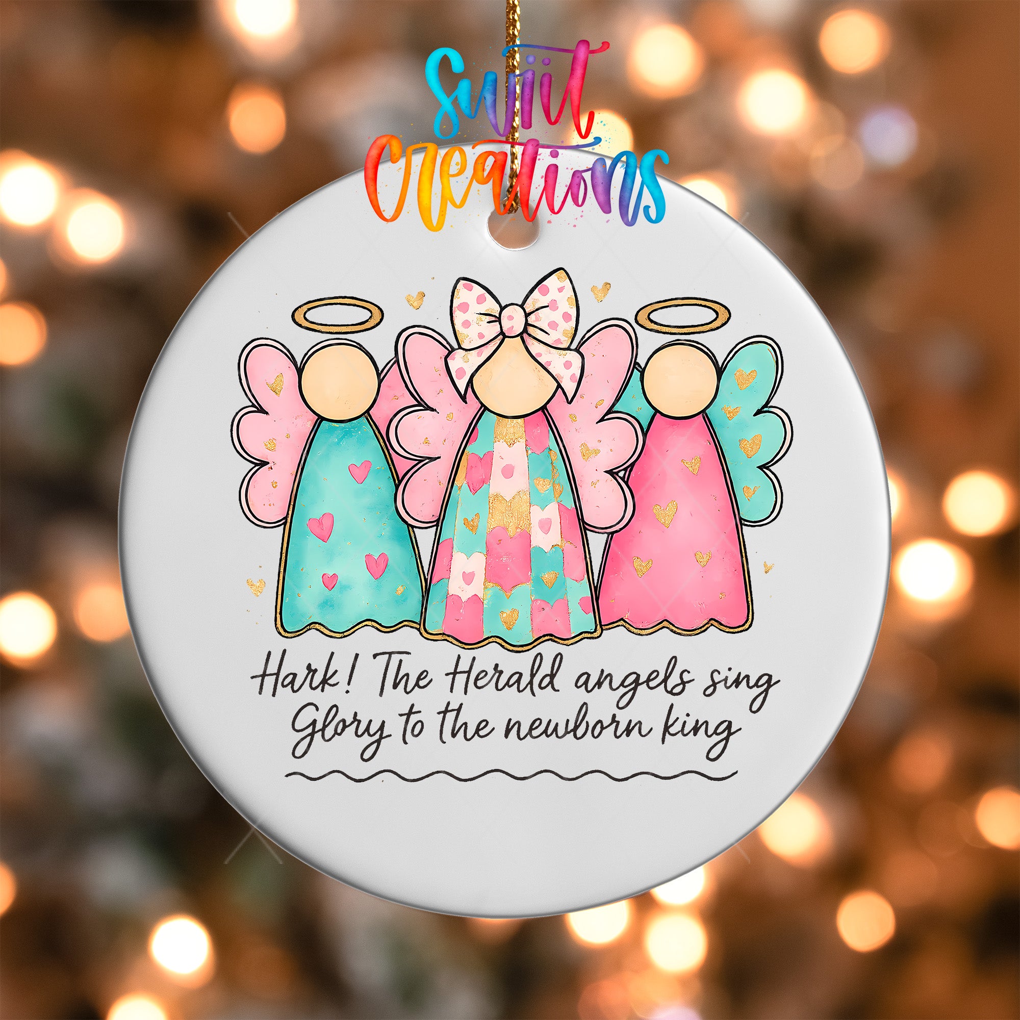 A decorative ornament featuring three colorful angel figures with haloes, accompanied by the text "Hark! The Herald angels sing glory to the newborn king"