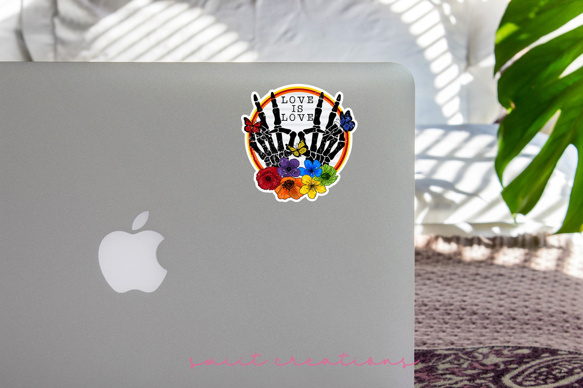 a laptop computer sitting on top of a table