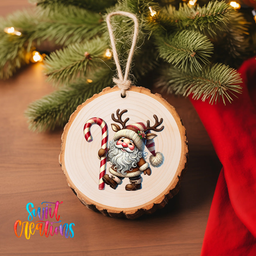 A wooden ornament featuring a Santa Claus figure holding a candy cane and reindeer antlers, hanging on a Christmas tree.