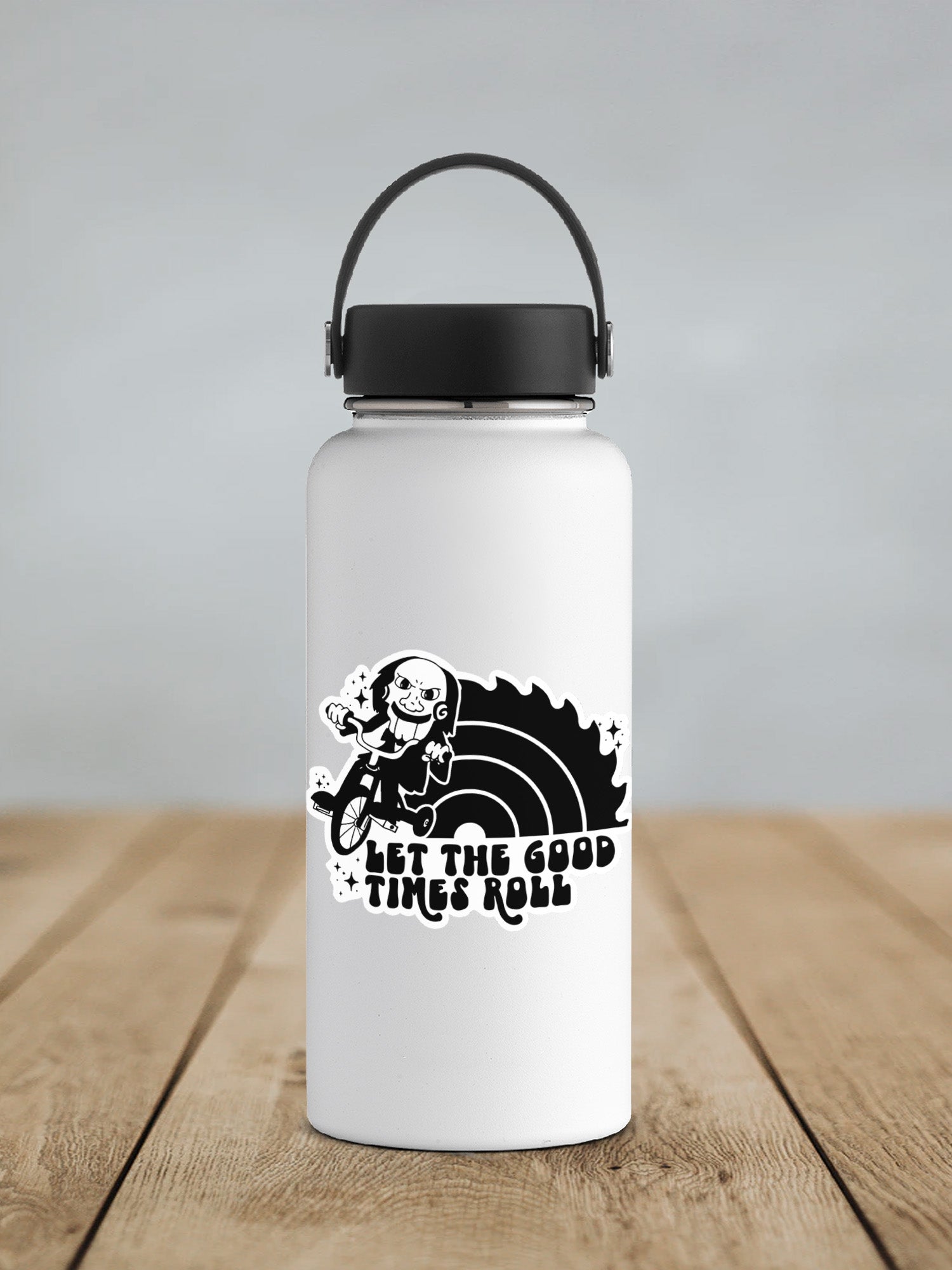 a white water bottle sitting on top of a wooden table