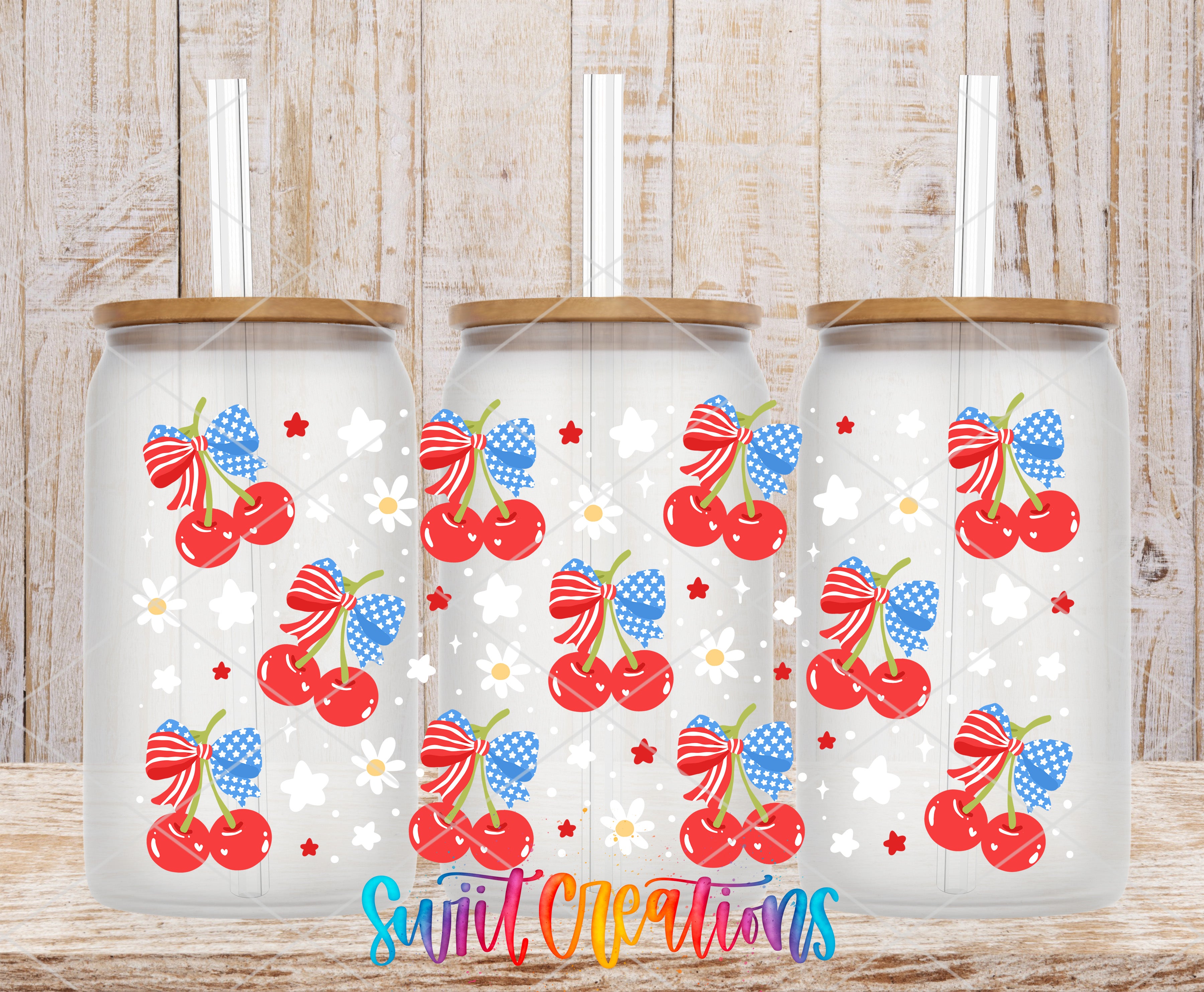 Three glass tumblers with a patriotic design featuring cherries, stars, and stripes.