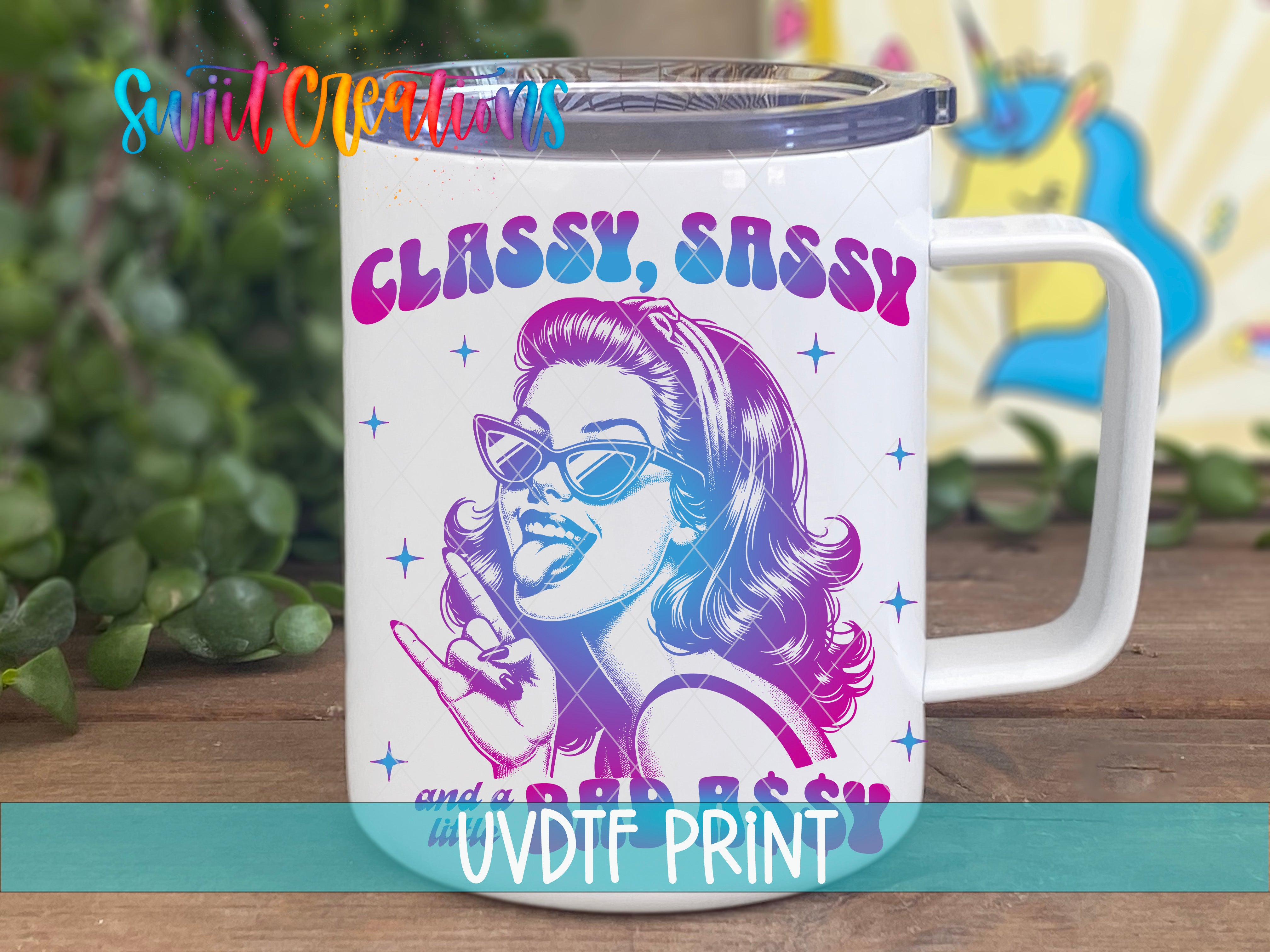 A white mug with a colorful graphic design featuring a woman with sunglasses and a retro style.