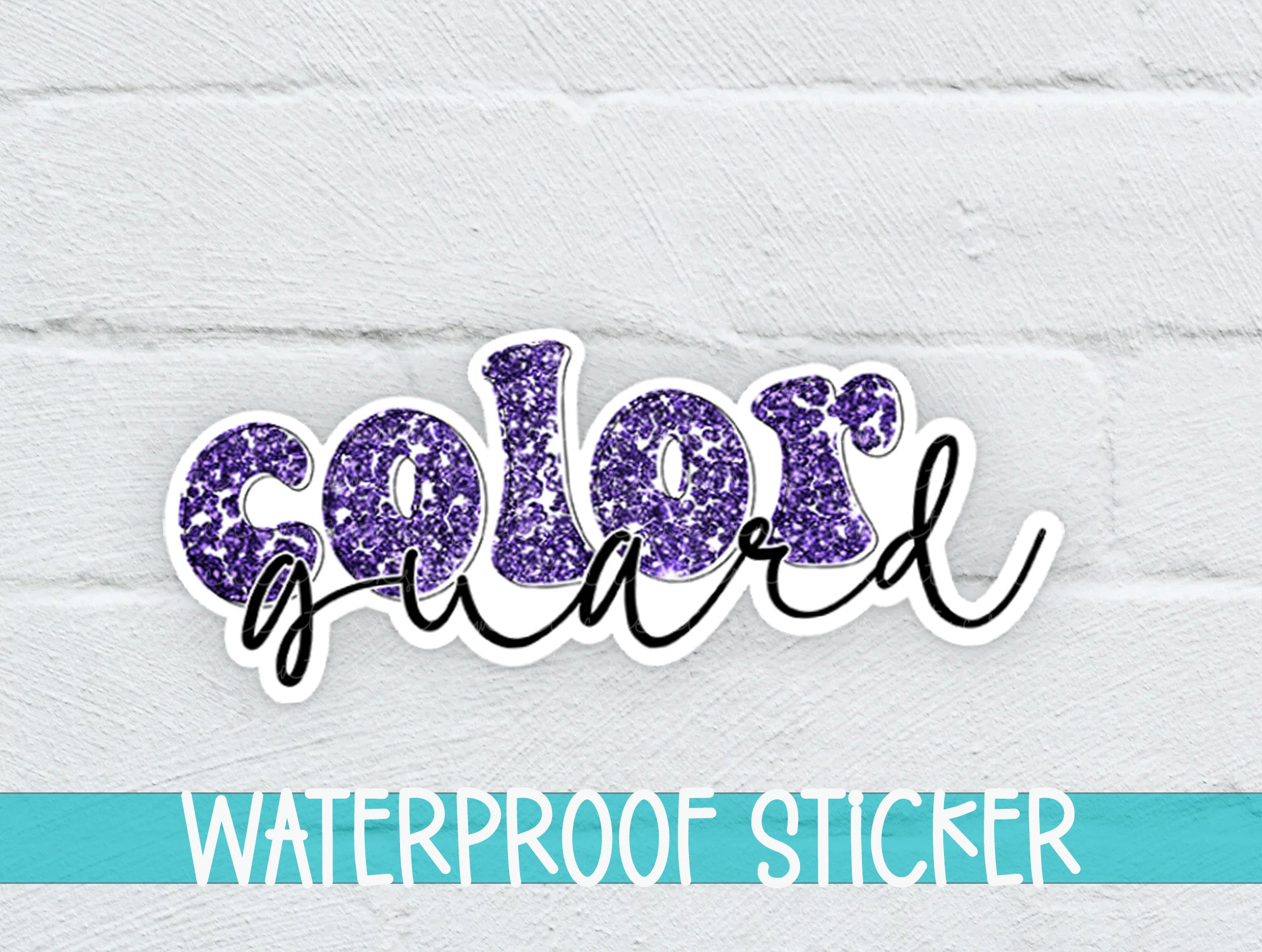 a white brick wall with a purple and blue glitter word sticker on it