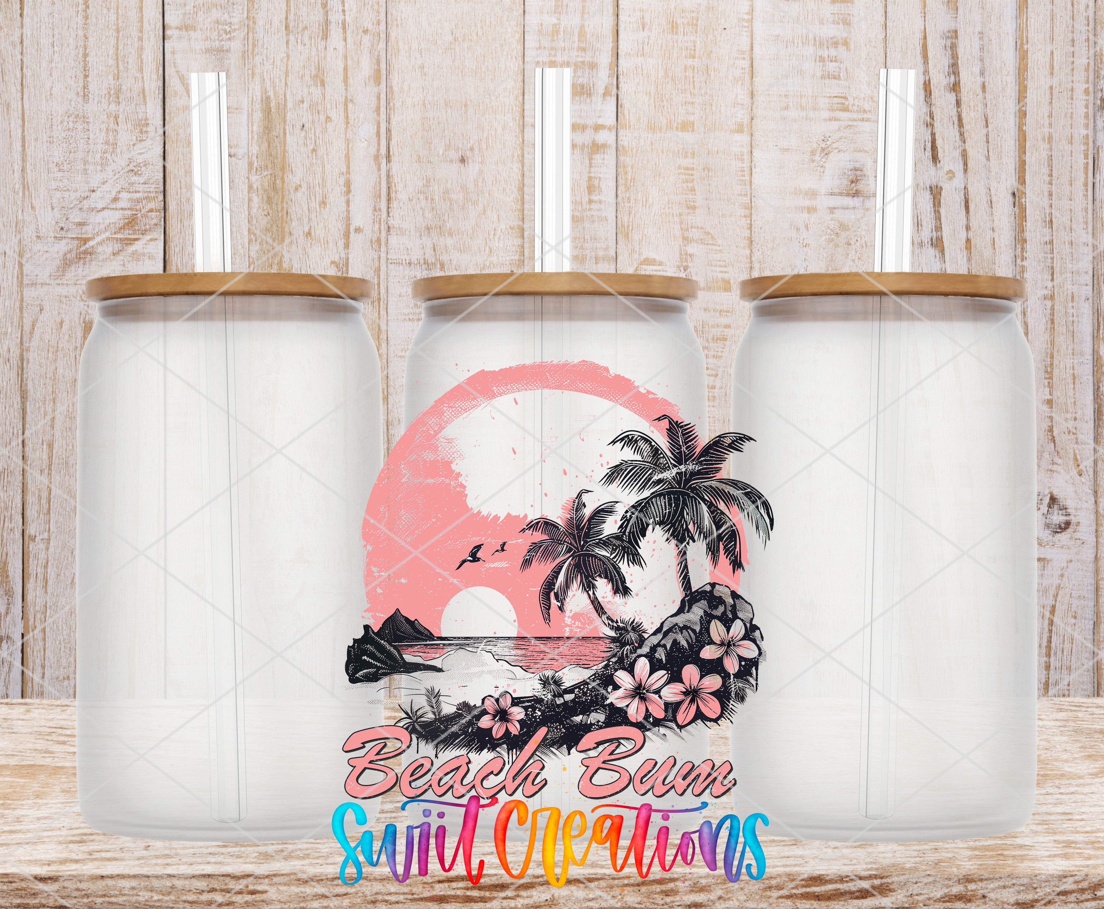 three clear glass jars with straws, each containing a tropical scene with palm trees and a sunset. The jars are arranged in a row, with the middle one having a pink and black design and the other two having a white and brown design. The text "Beach Bum Surf Cilies" is displayed in the center of the image.
