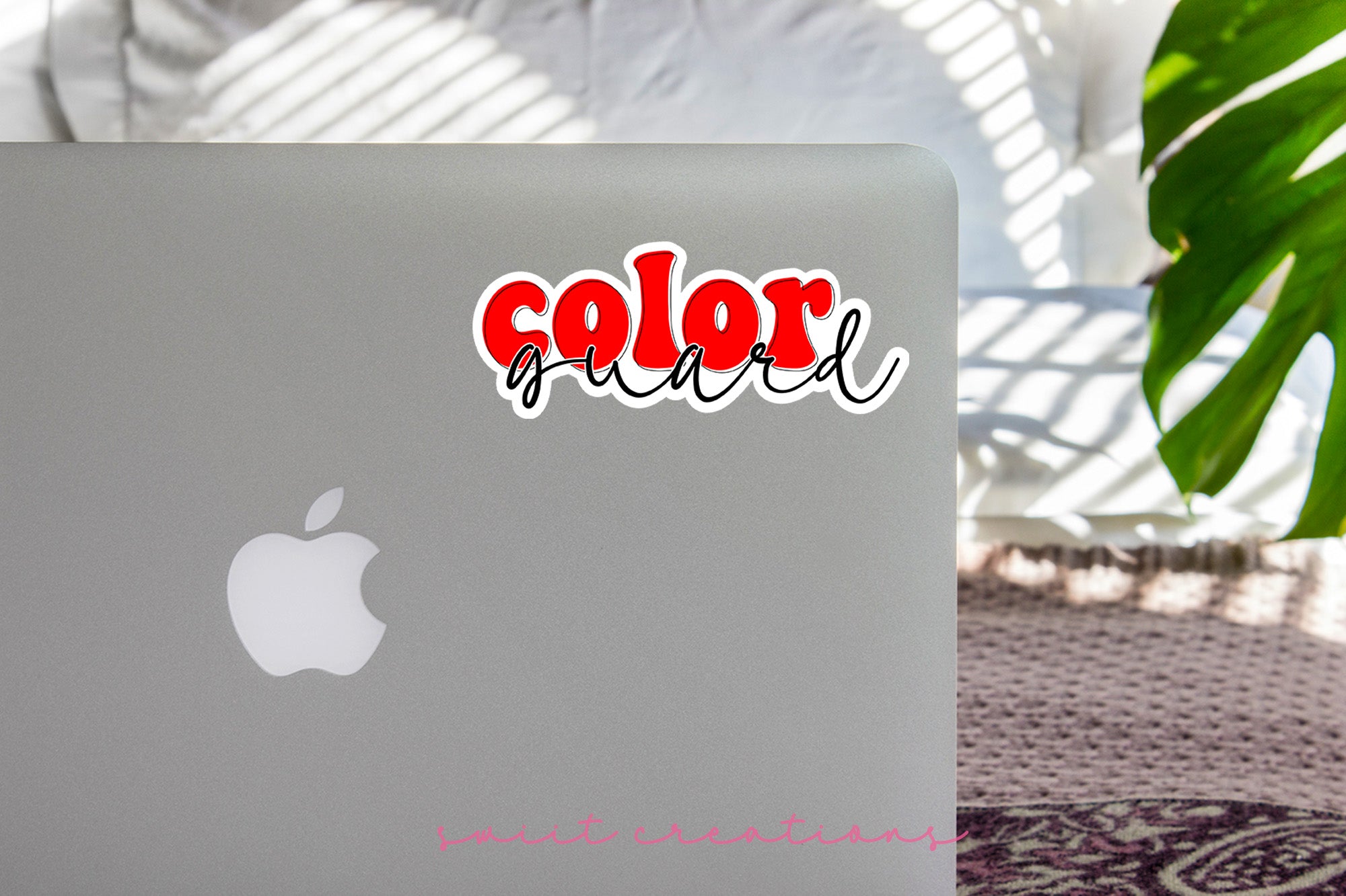 a laptop computer sitting on top of a table