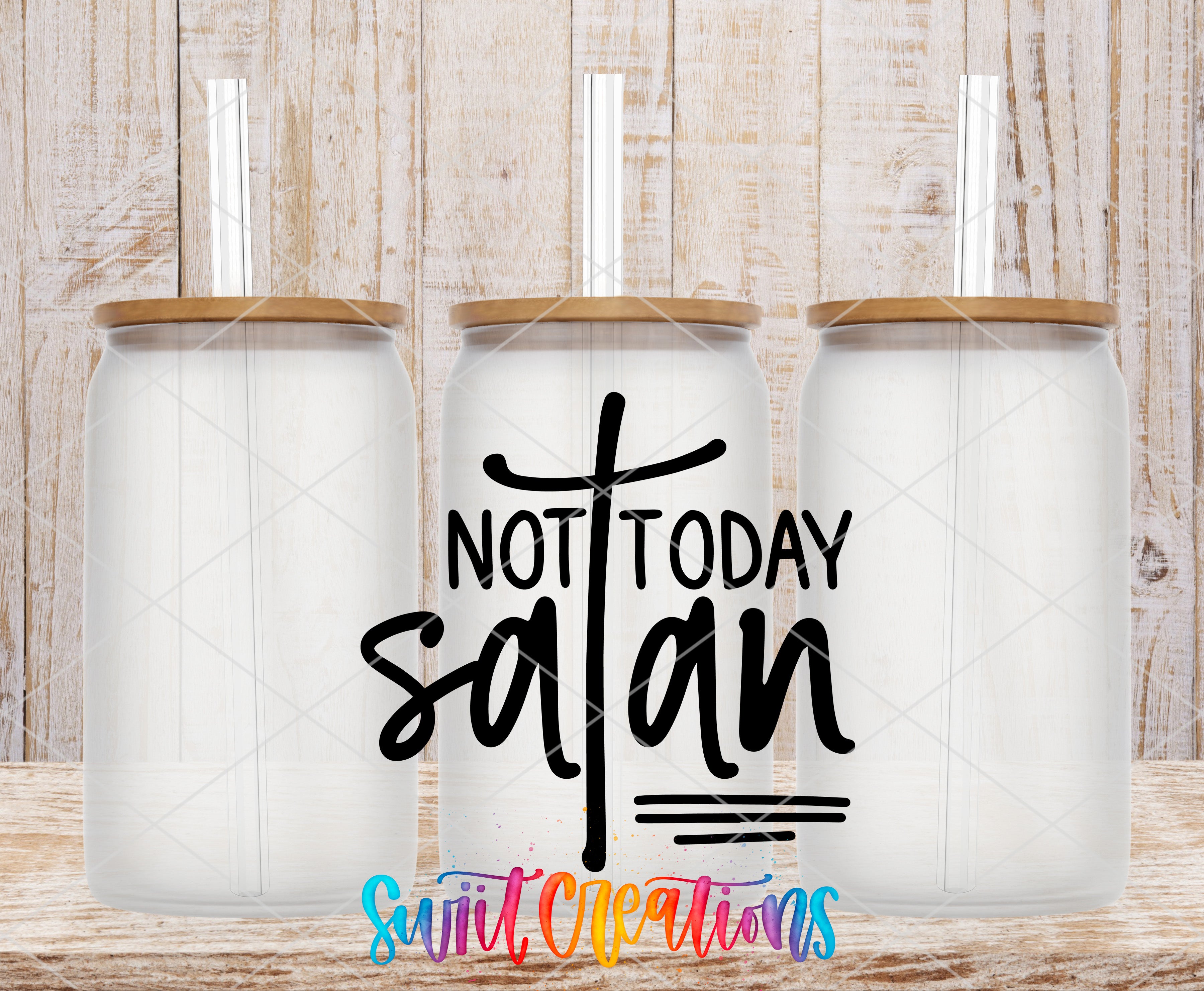 three clear glass jars with wooden lids, arranged in a row against a wooden background. The text "NOT TODAY SATAN" is displayed prominently in the center of the image.