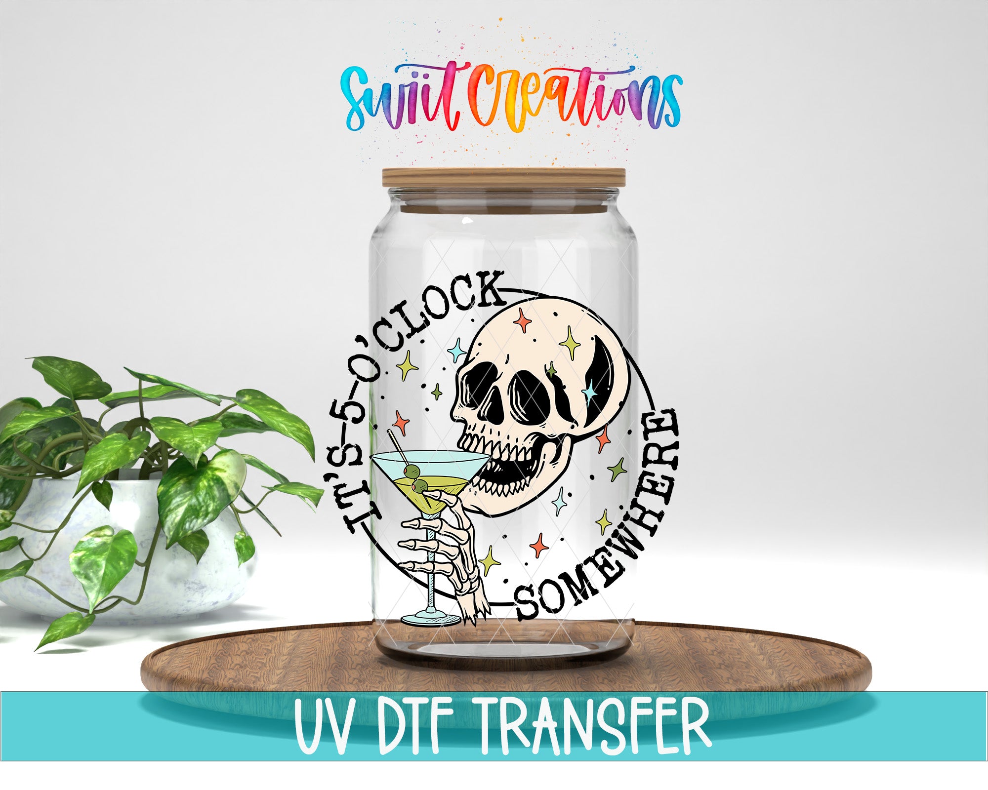 a glass jar with a skull and a cocktail glass inside, along with a colorful and whimsical design.