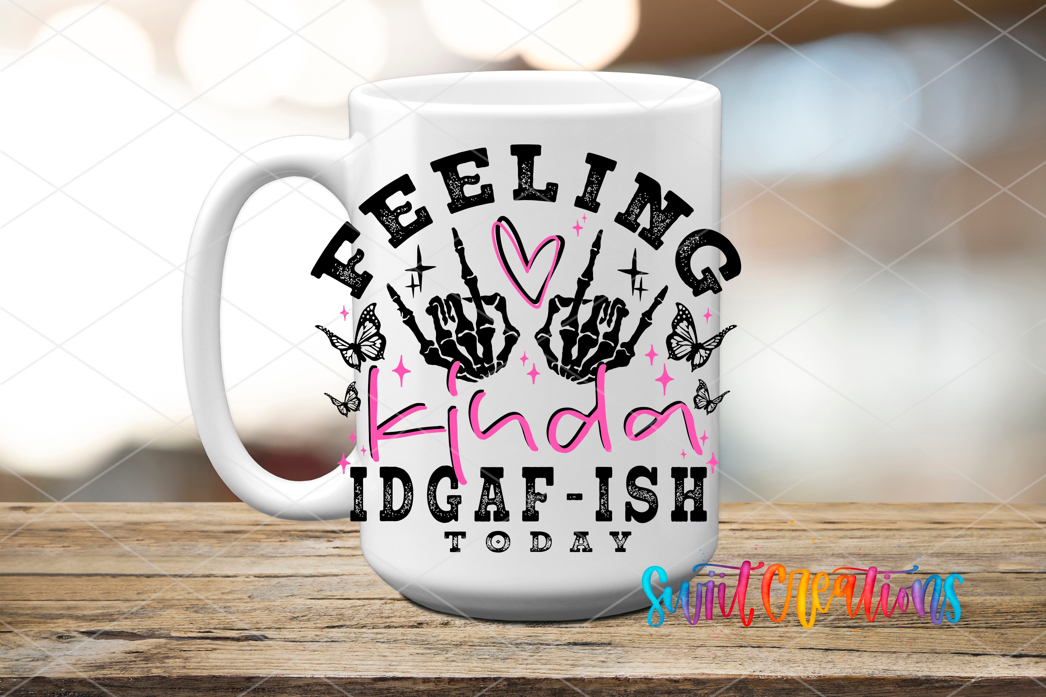 A white mug with a graphic design featuring text and illustrations related to the phrase "Feeling Kinda Idgafish Today".