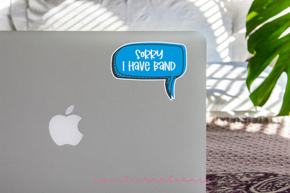 a laptop with a speech bubble sticker on it