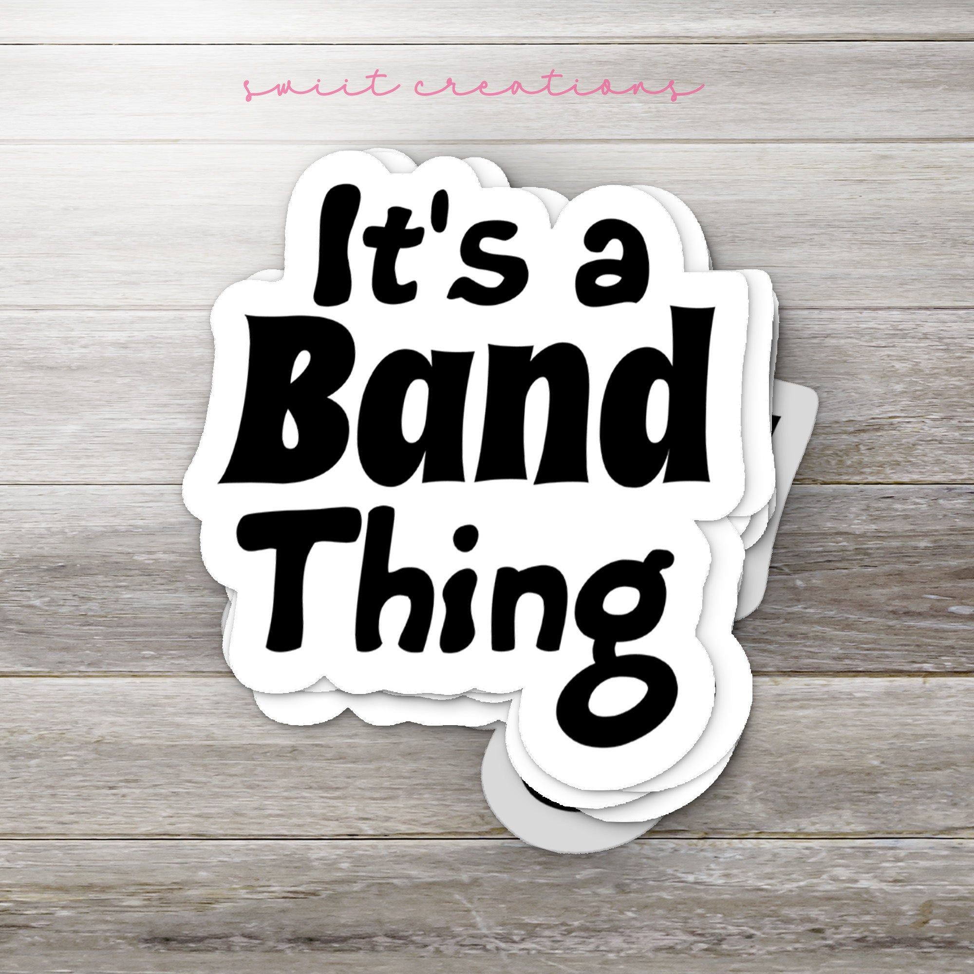 a sticker that says it's a band thing