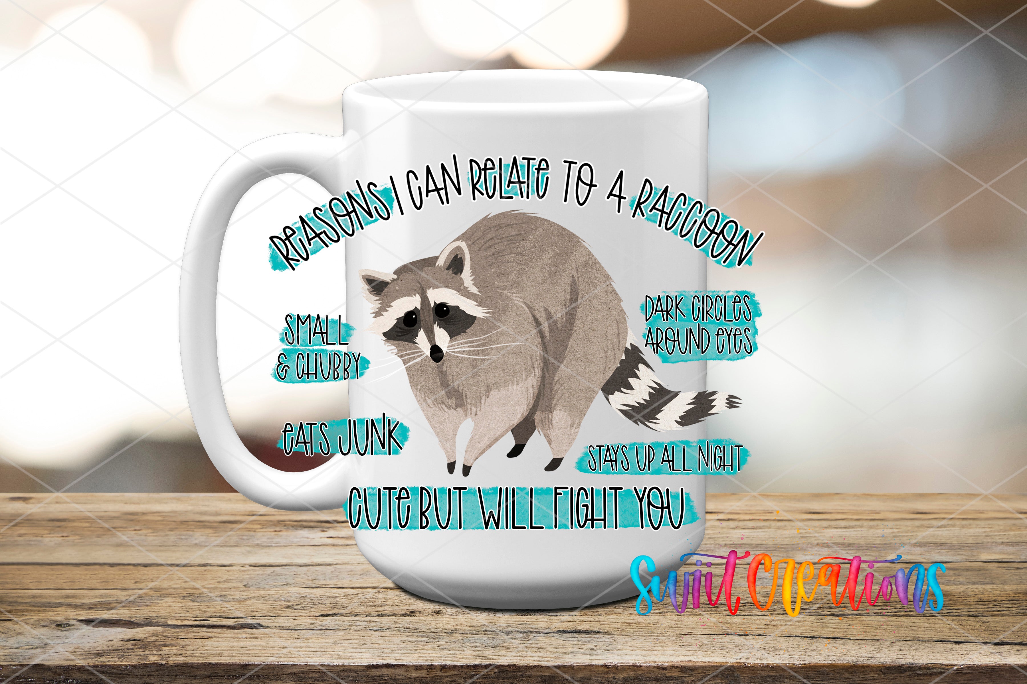 A white mug with a raccoon illustration and text surrounding it.