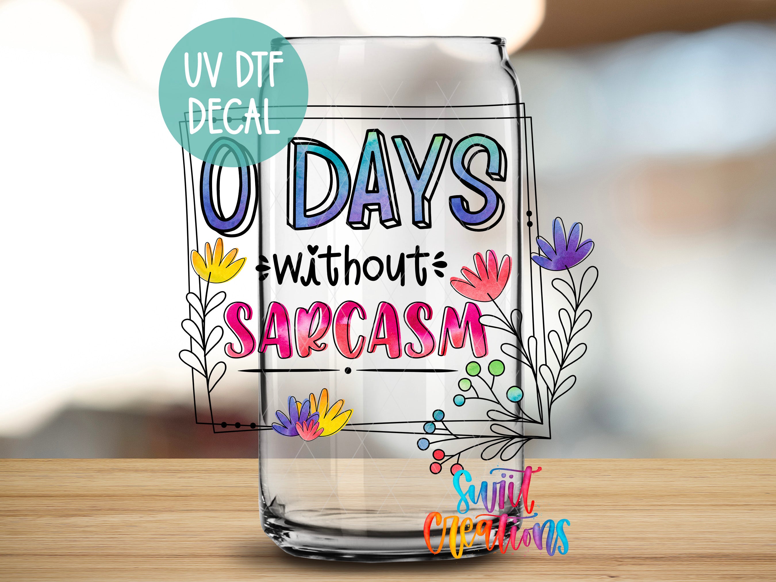 a glass with a message on it sitting on a table