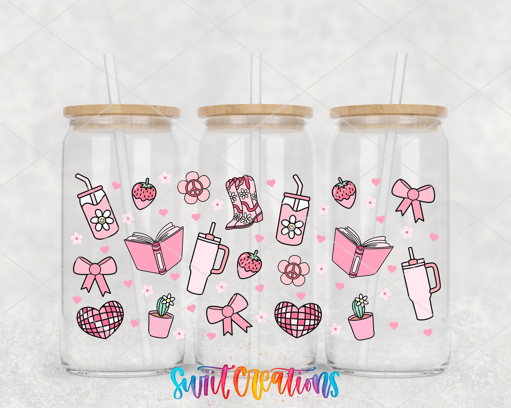 Three glass tumblers with straws, each decorated with various pink and white illustrations, including flowers, books, cups, and other whimsical objects.