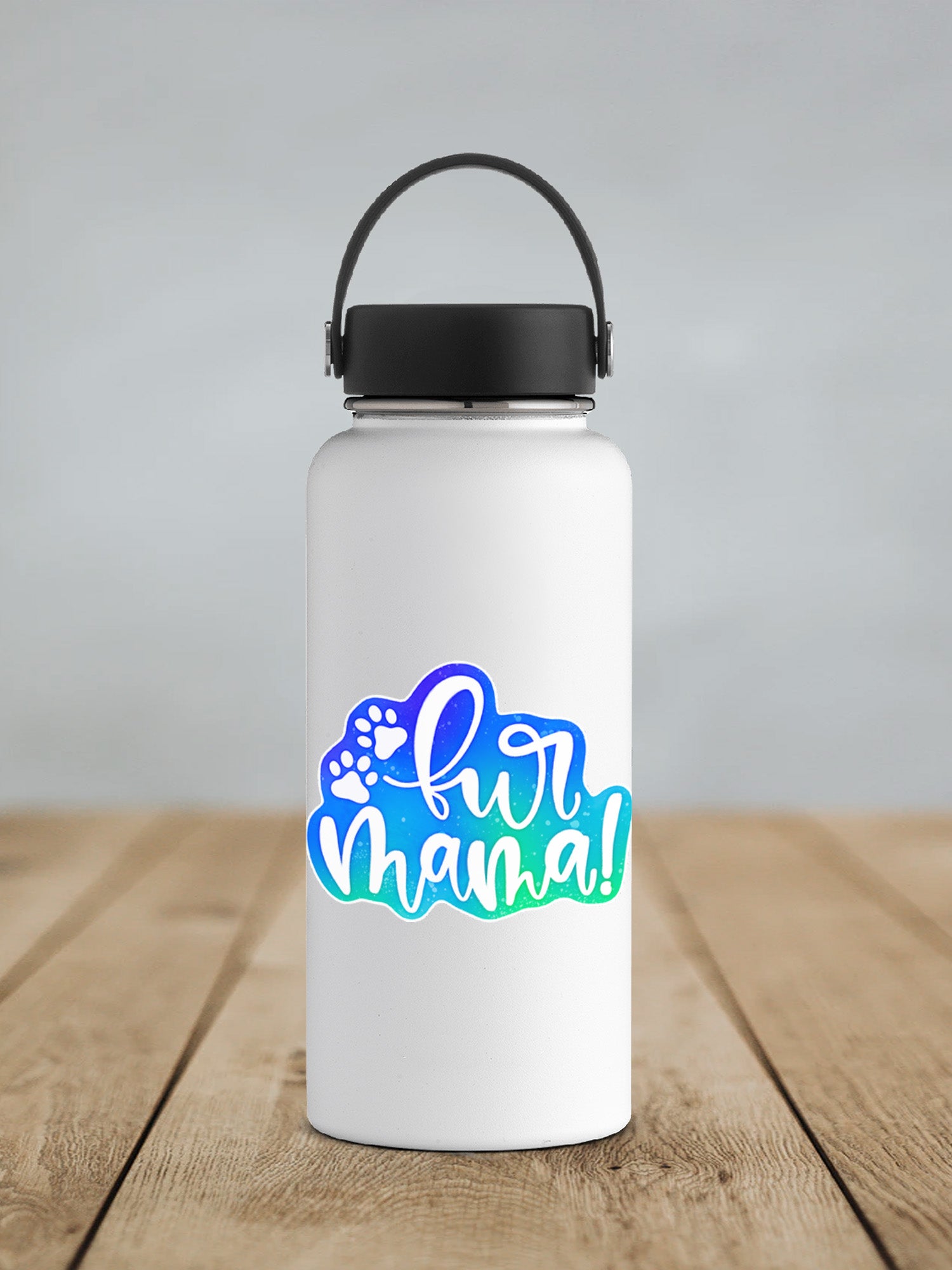 a white water bottle with a black lid on a wooden table