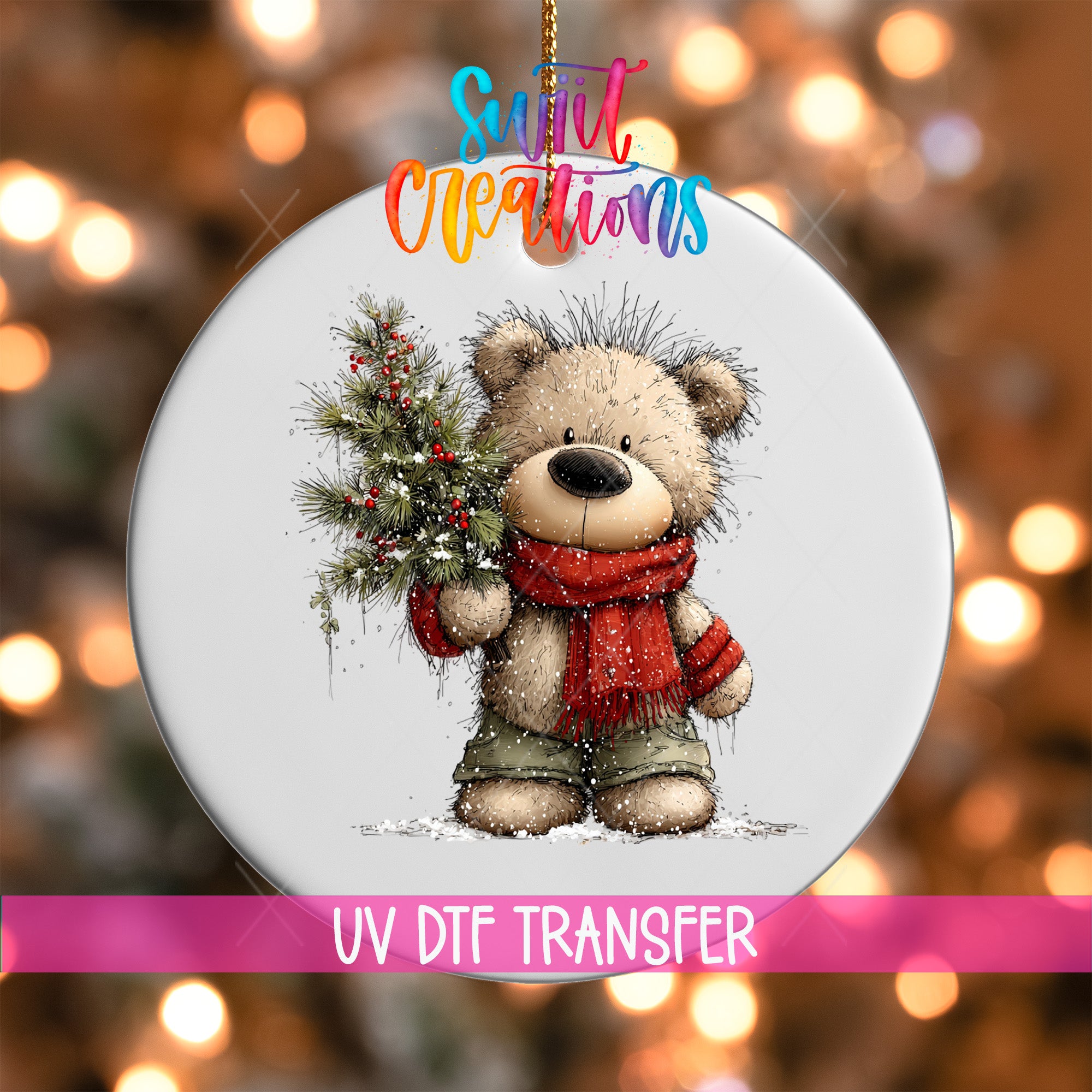 A white ornament with a teddy bear holding a Christmas tree, set against a background of colorful lights.