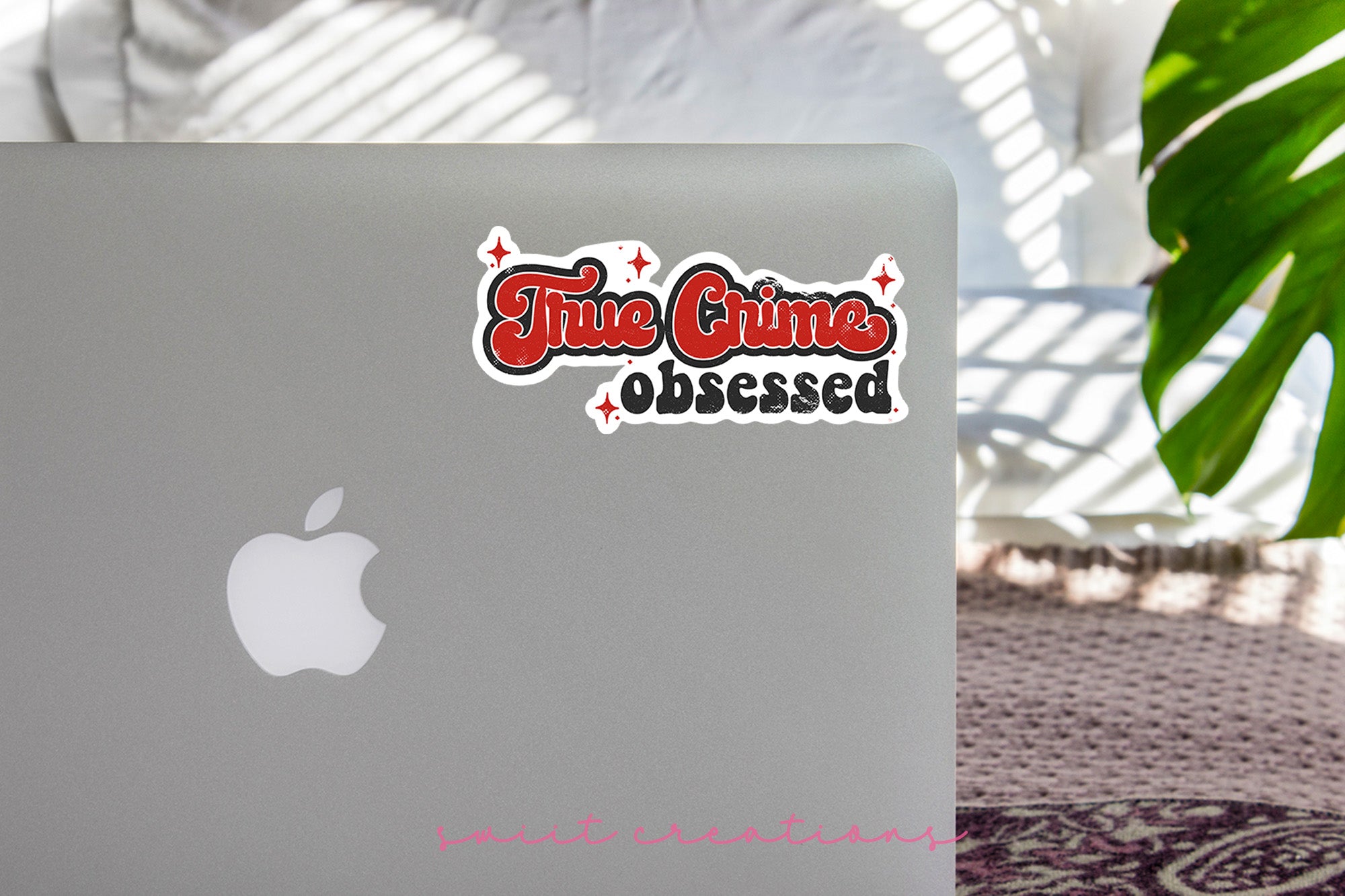 a laptop computer sitting on top of a table