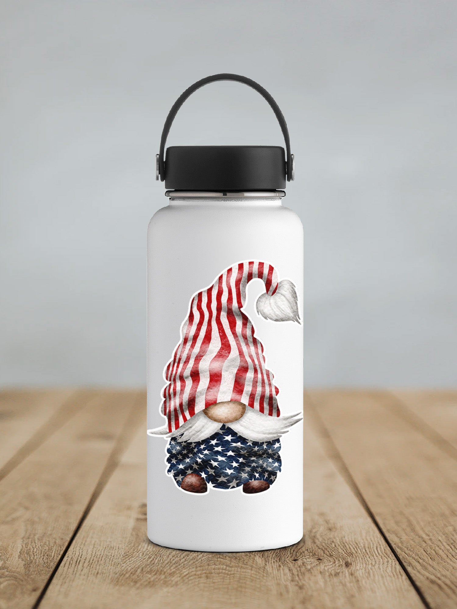 a water bottle with a picture of a gnome with an american flag on it