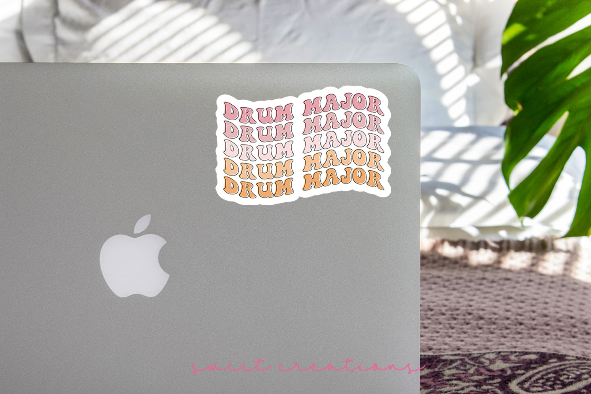 a laptop computer sitting on top of a table