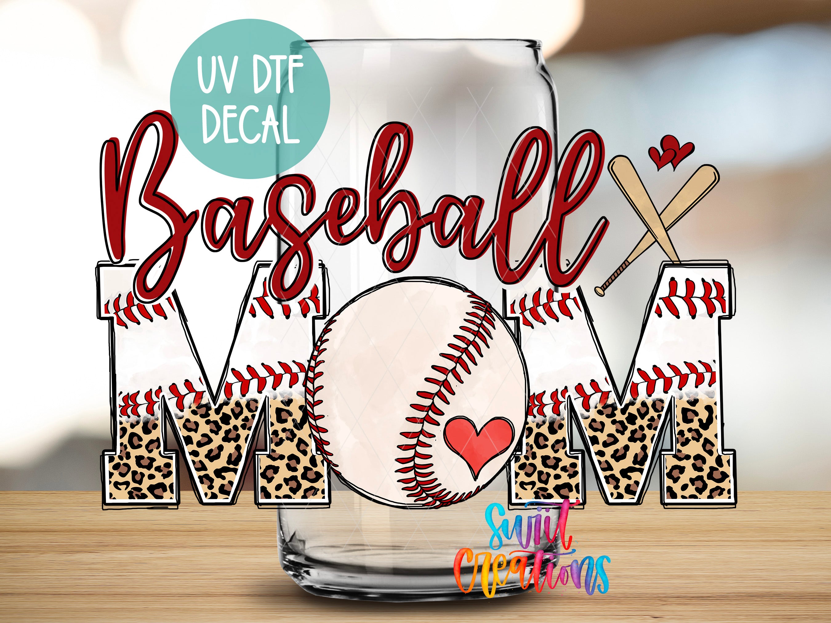 a glass with the word "Baseball Mom" written on it, along with baseball-related elements such as a baseball, a bat, and leopard print.