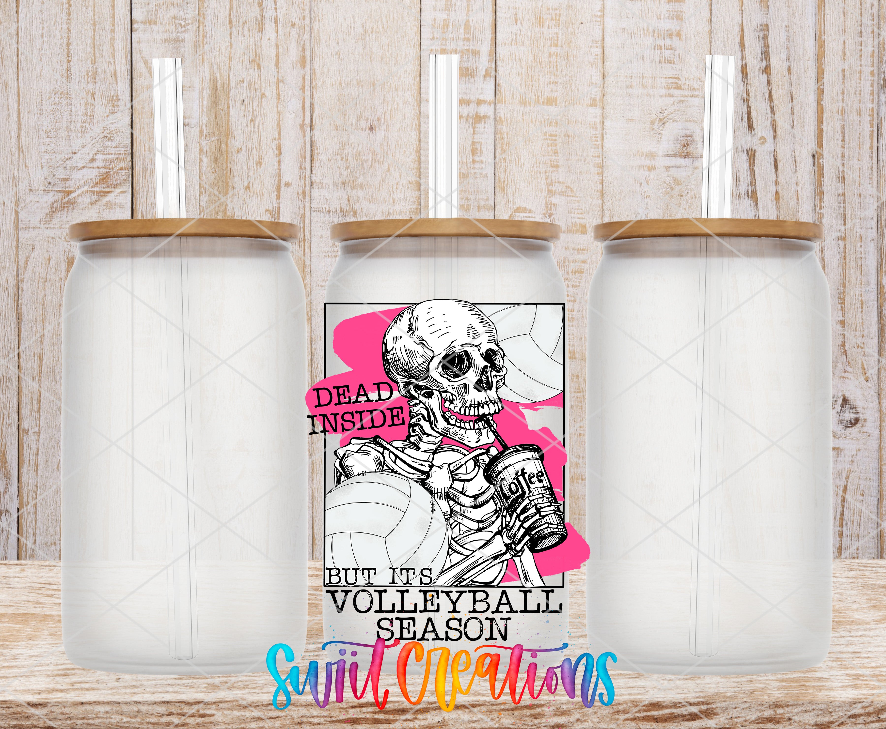A white tumbler with a lid and straw, featuring a graphic design of a skeleton holding a volleyball and the text "Dead inside but its volleyball season".