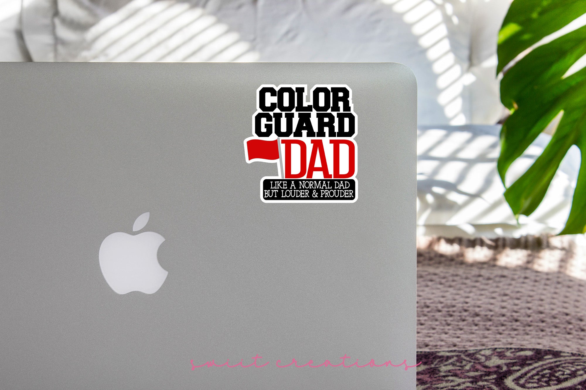 a laptop computer sitting on top of a table