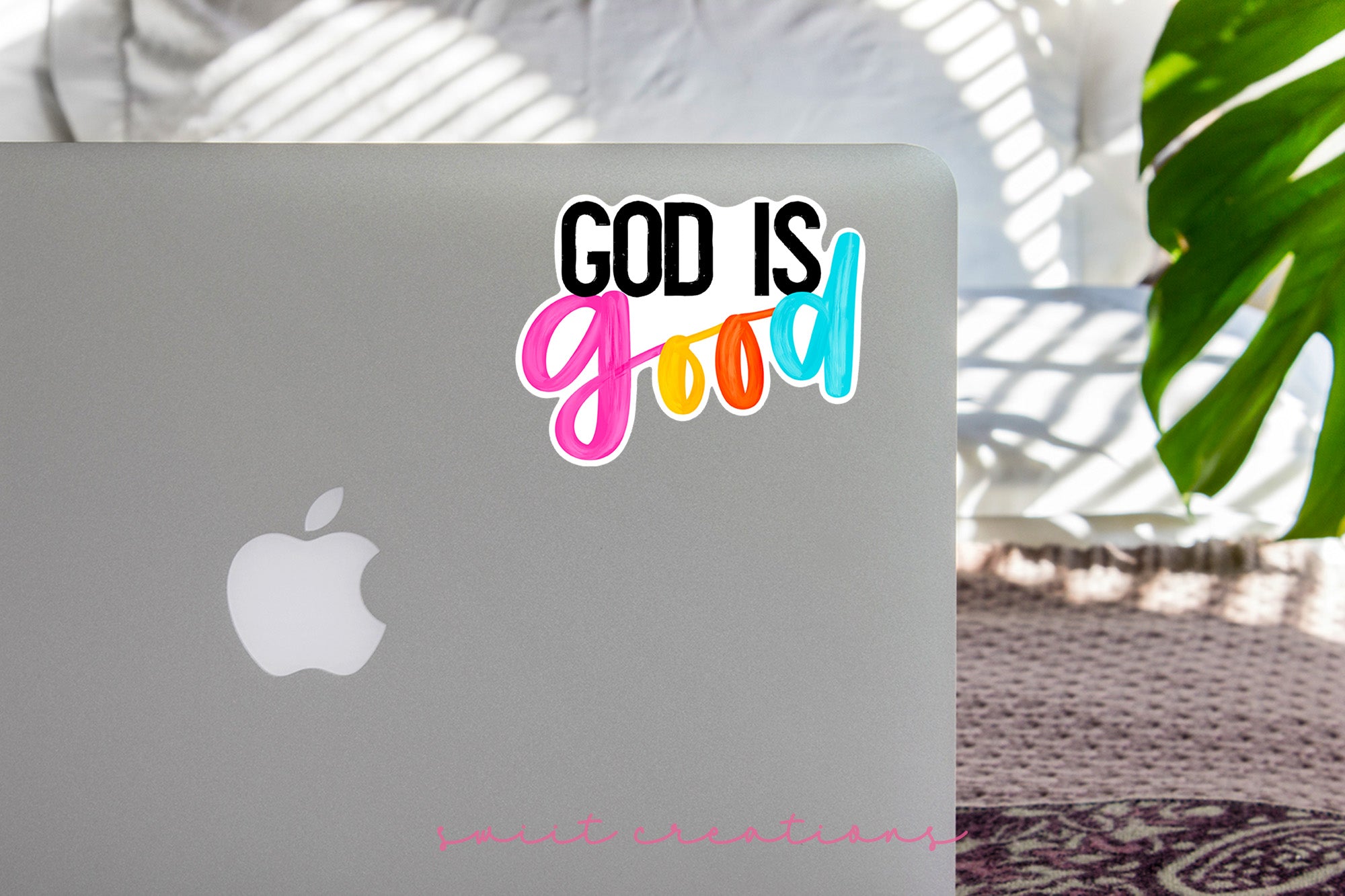 a laptop computer sitting on top of a table