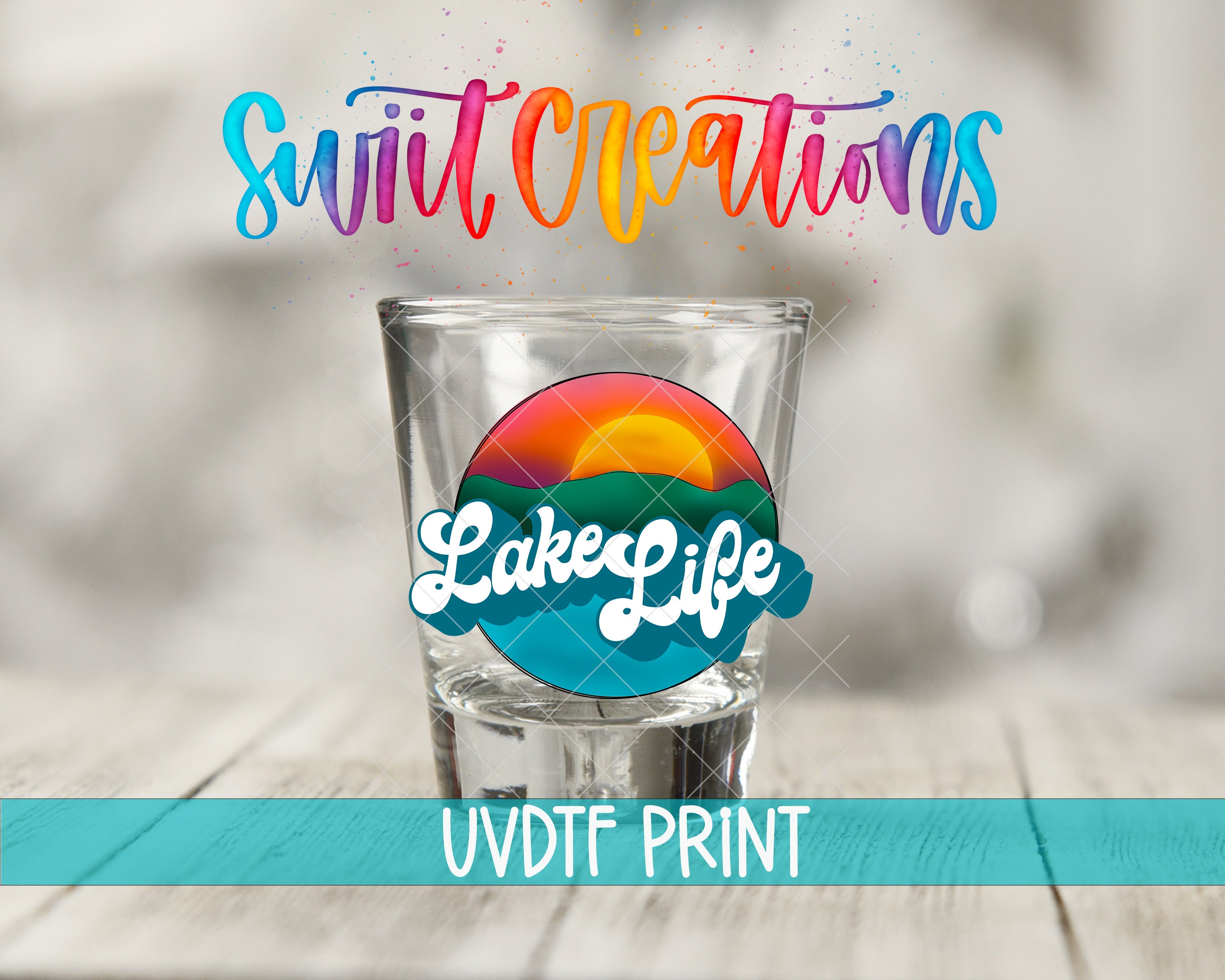 a shot glass with a colorful design and text, including the words "Lake Life" and "Swift Creations".