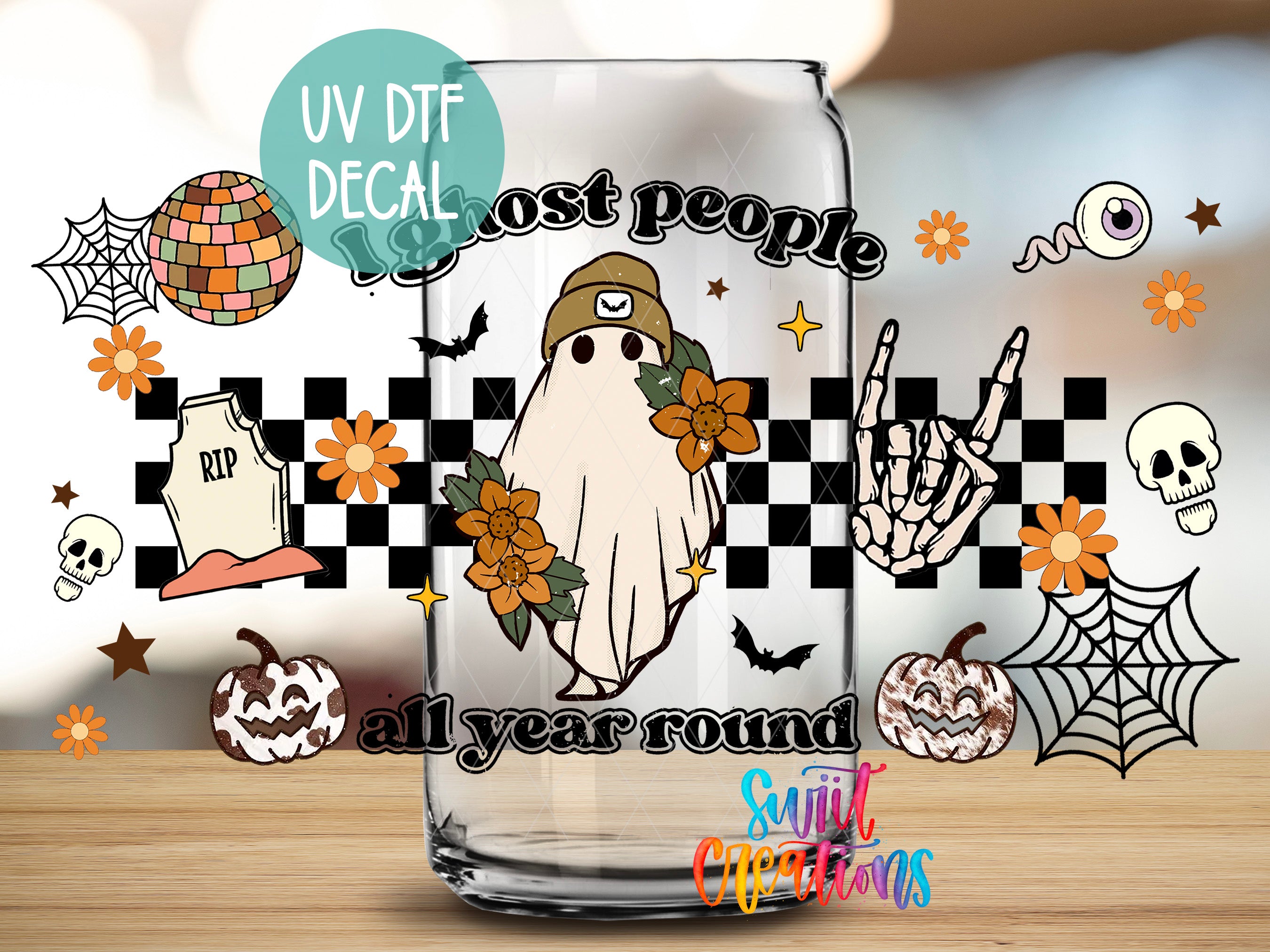 The image is a Halloween-themed decal featuring a ghost, skulls, flowers, pumpkins, and a DJ ball. The text "UV Dtf DECAL" is displayed, and the phrase "all year round" is written below the ghost.