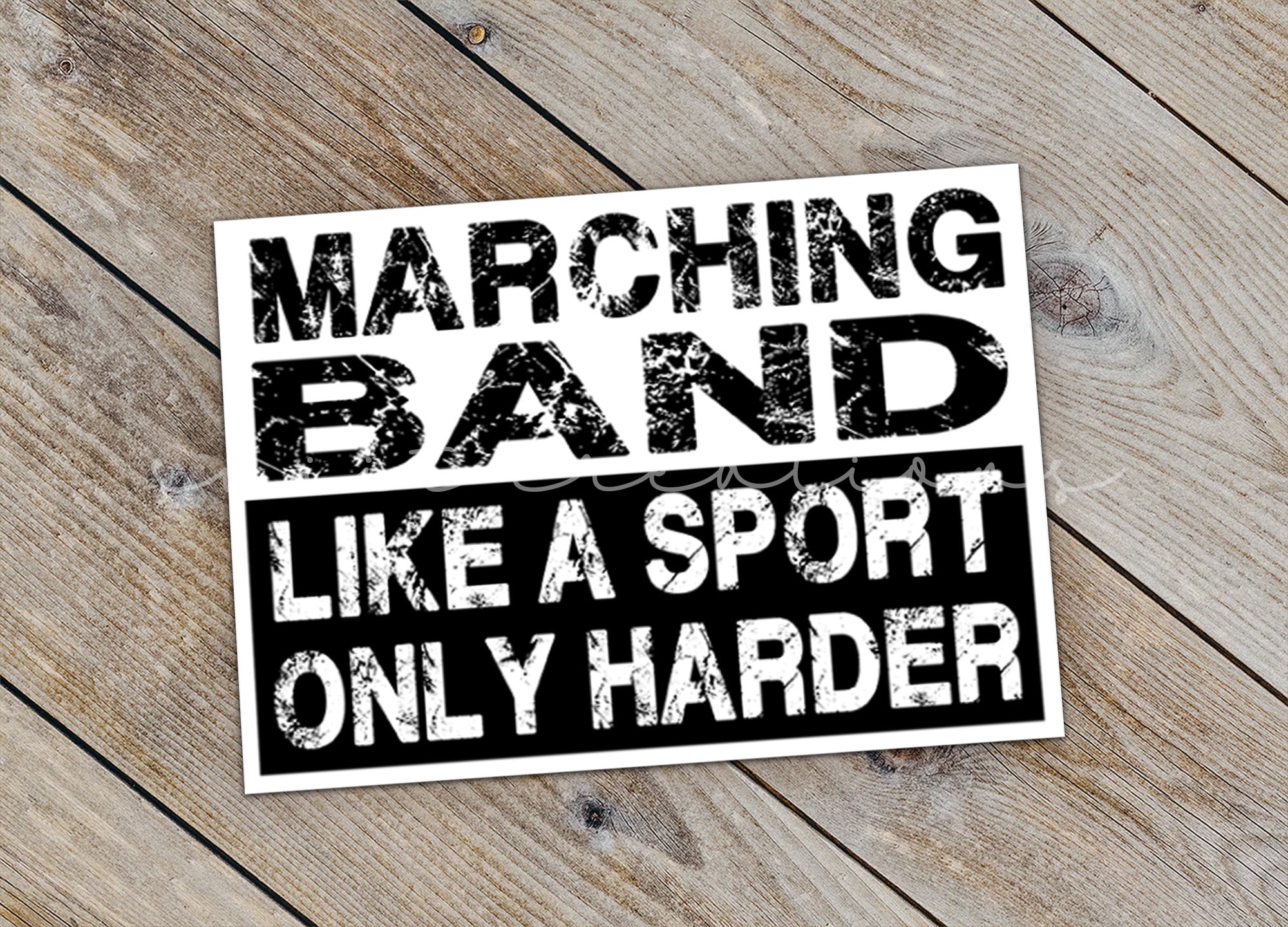 a sticker that says marching band like a sport only harder