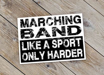 a sticker that says marching band like a sport only harder