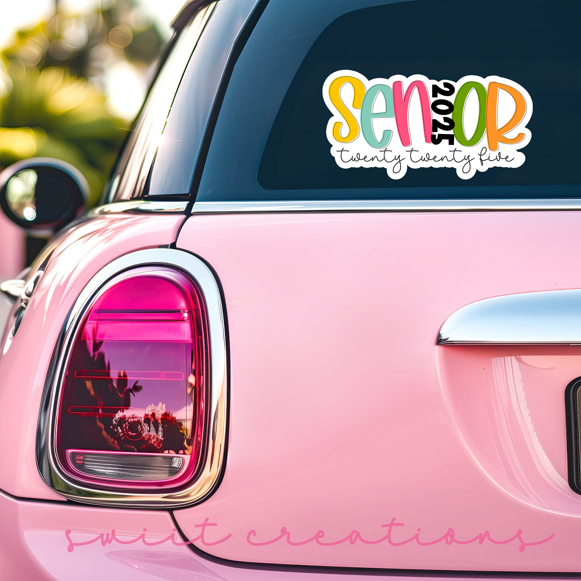 a pink car with the word semor on it
