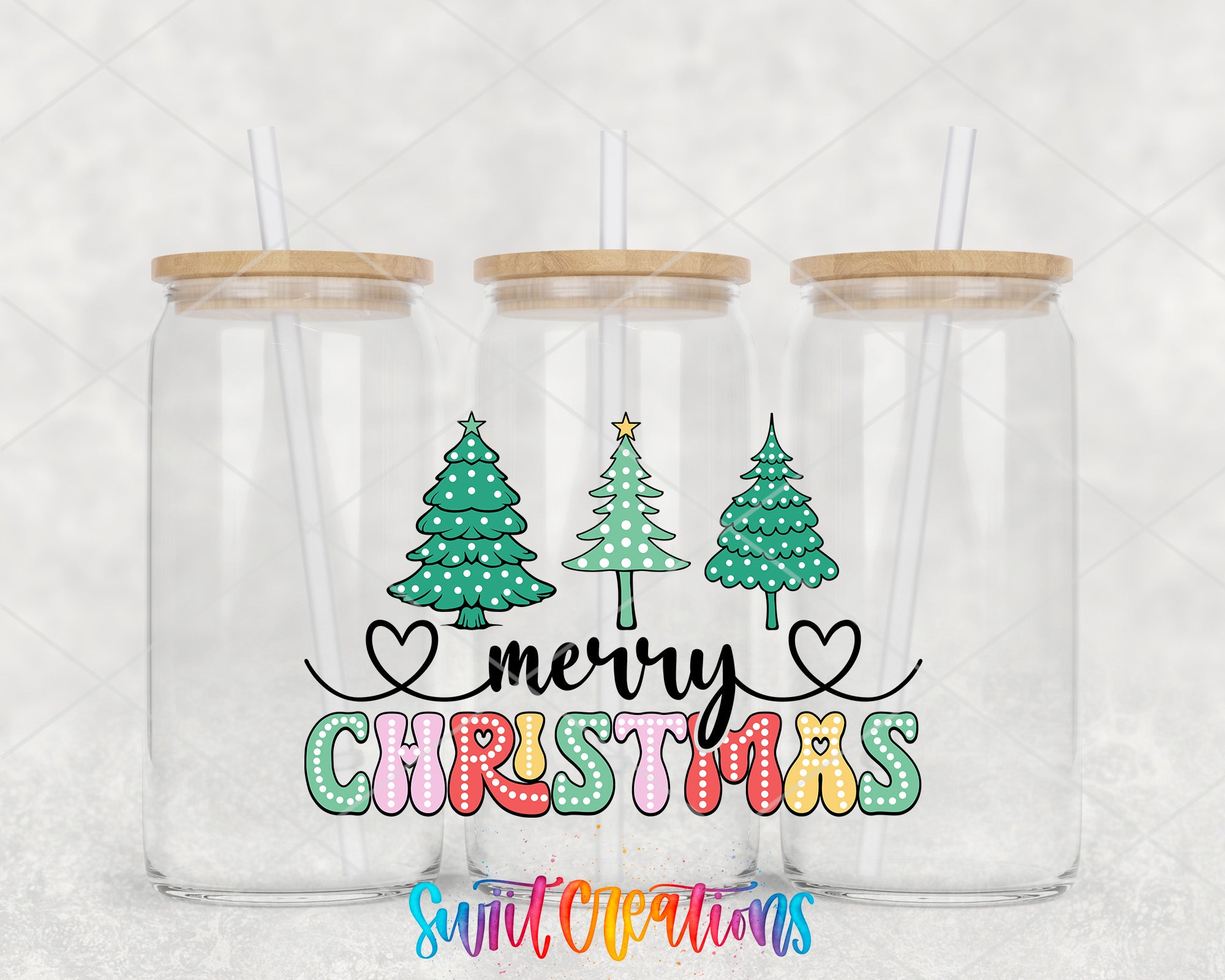 three clear glass jars with wooden lids, each with a straw. The jars are arranged in a row, and there is a colorful text overlay that reads "merry christmas" in a festive font.