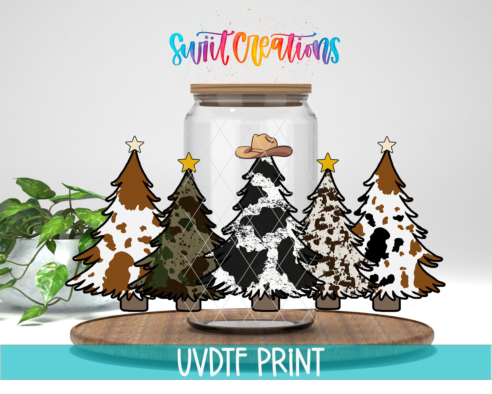 A glass jar containing stylized Christmas trees with various patterns, such as camouflage and spotted, placed on a wooden surface. Above the jar, there is text that reads "Swift Creations" in a colorful, handwritten font.