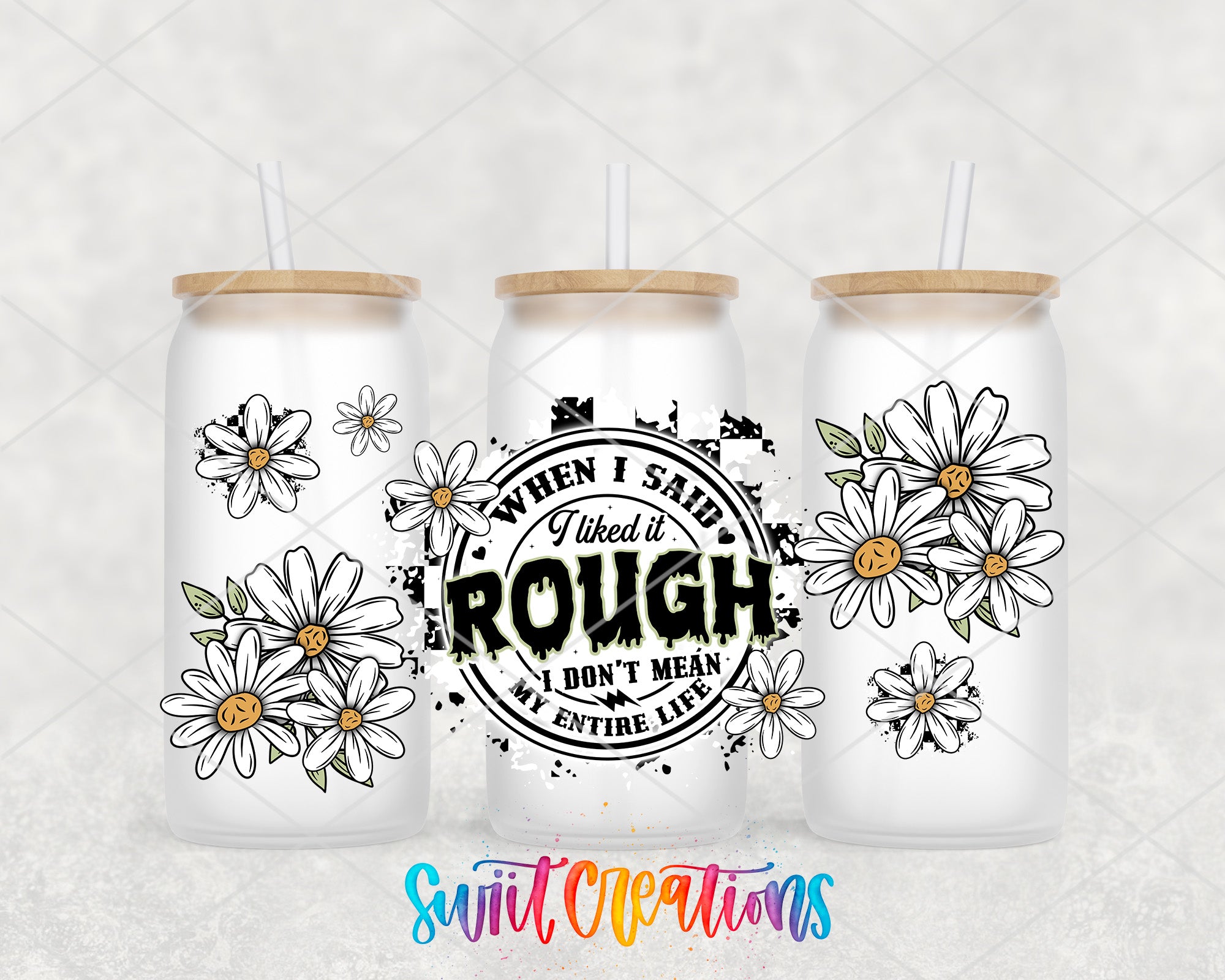 three white glass tumblers with flower designs and text printed on them.