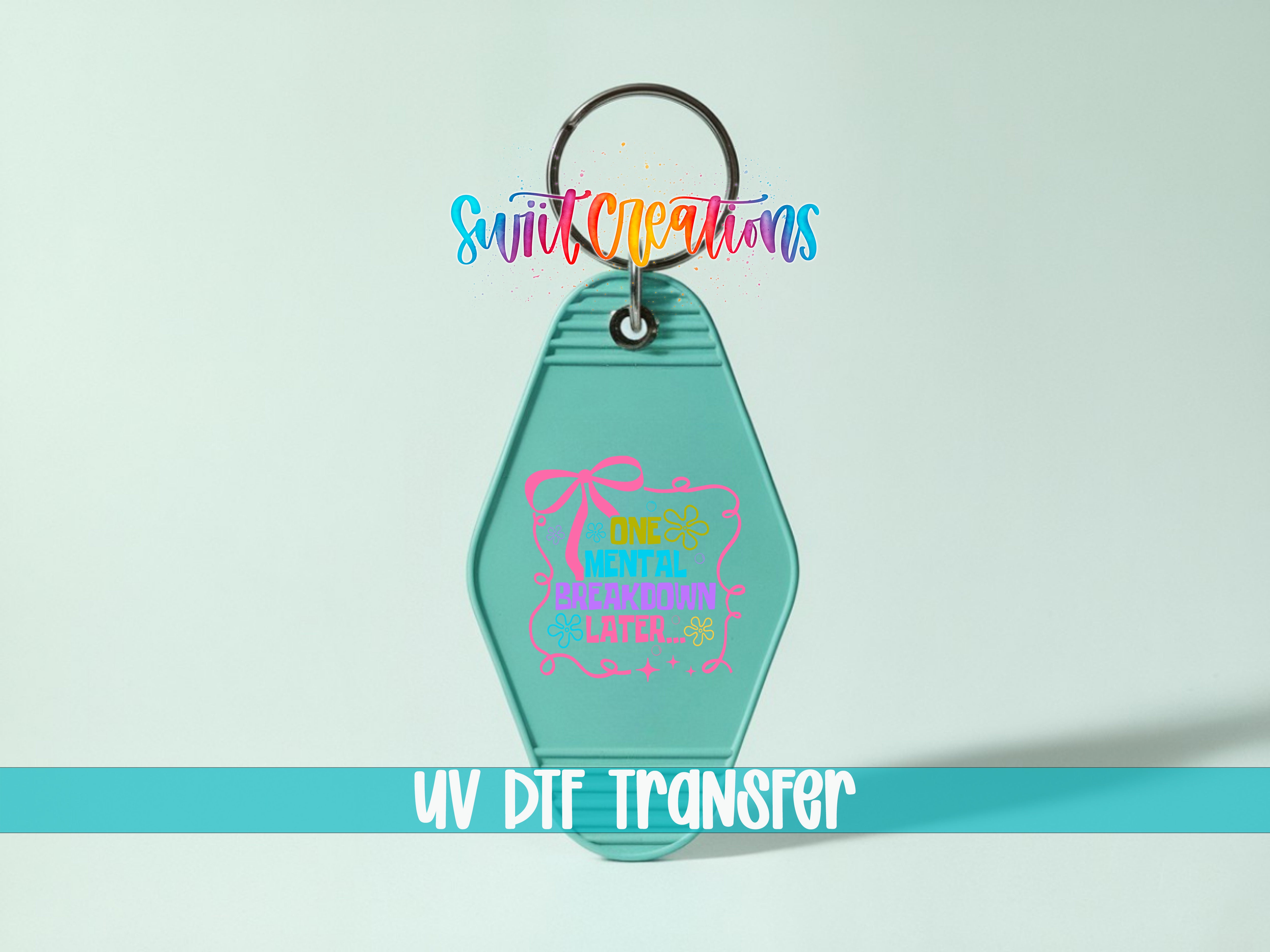 A keychain with a colorful design and text, including the words "Sunrise" and "Lunch".