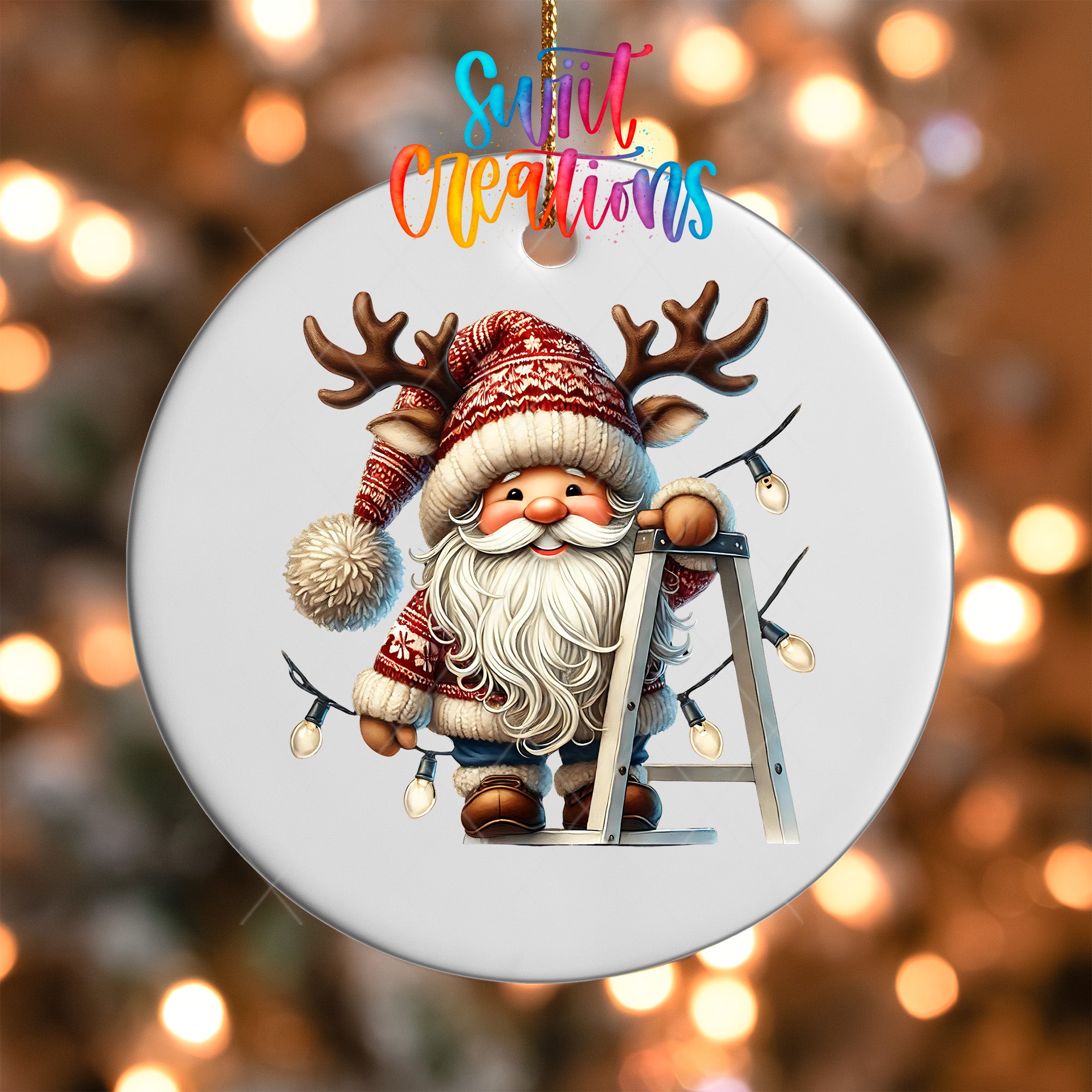 A white ornament featuring a smiling Santa Claus with antlers and a ladder, surrounded by Christmas lights.