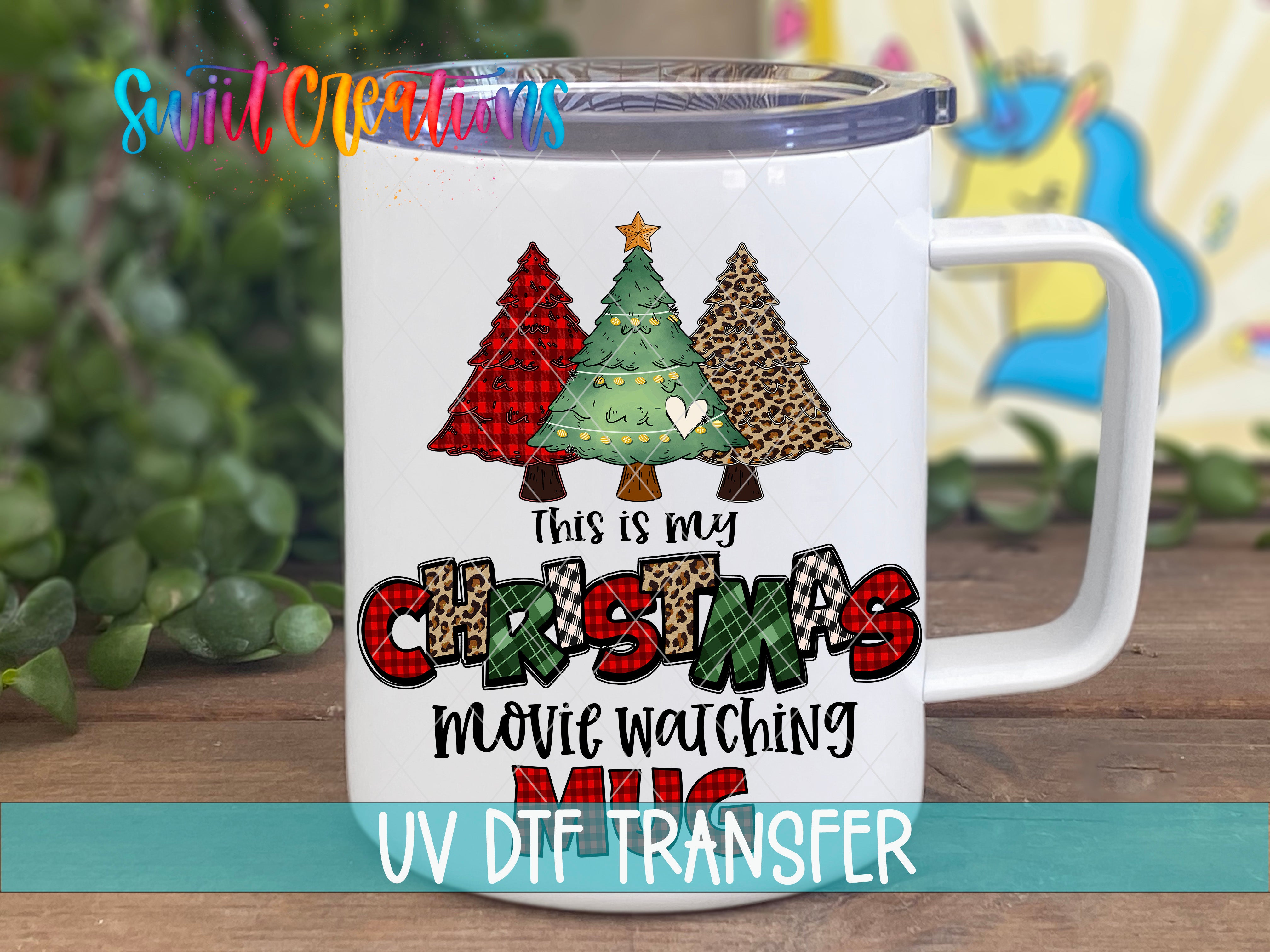 This image features a white mug with a Christmas tree design and text printed on it.