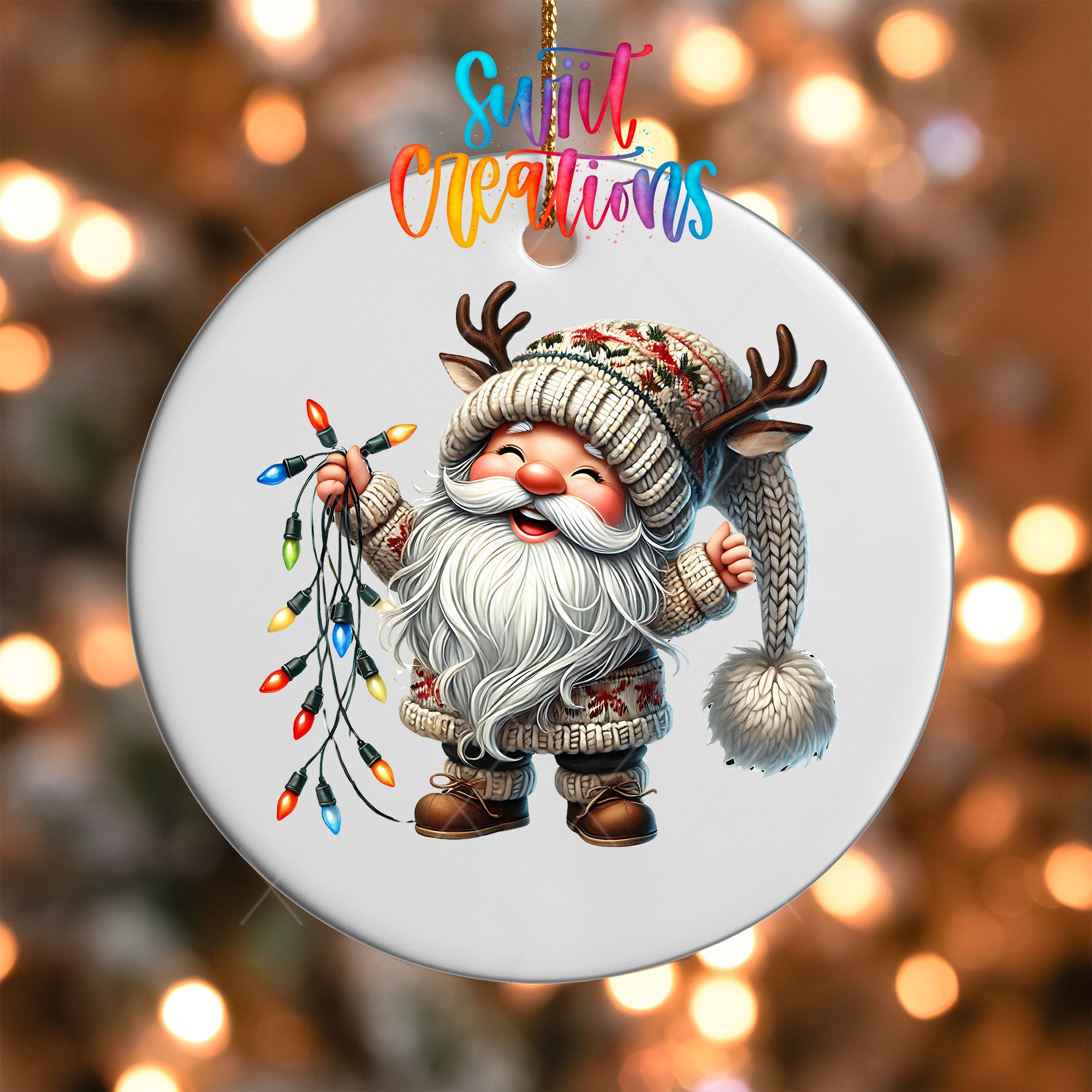 A white ornament featuring a smiling gnome with a long beard and antlers, holding a string of colorful Christmas lights.