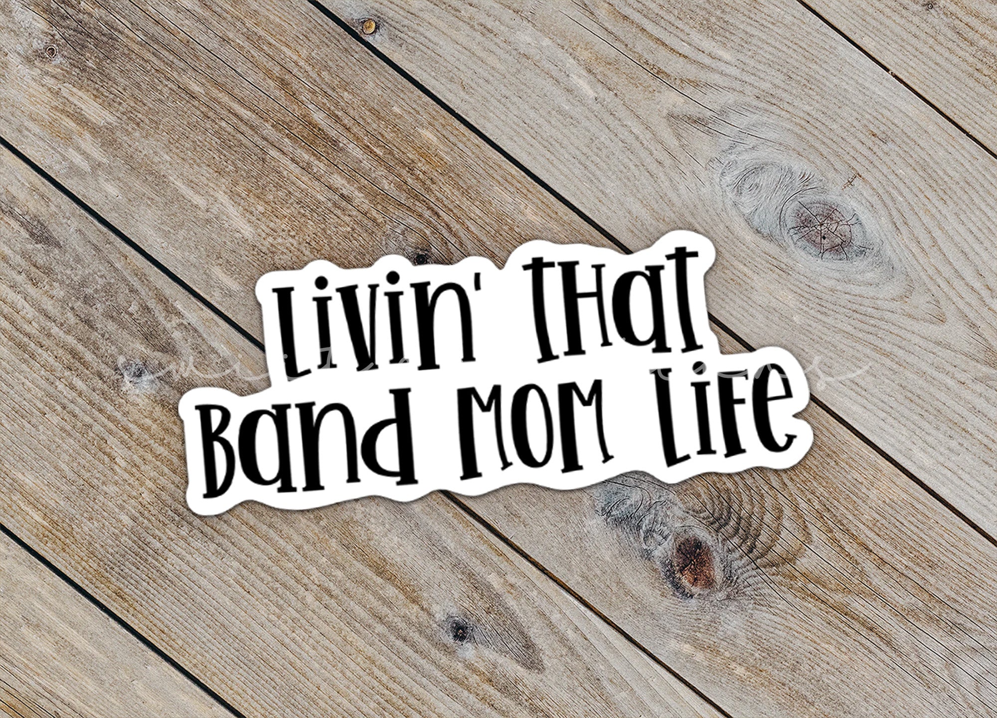 a sticker that says livn't that band mom life
