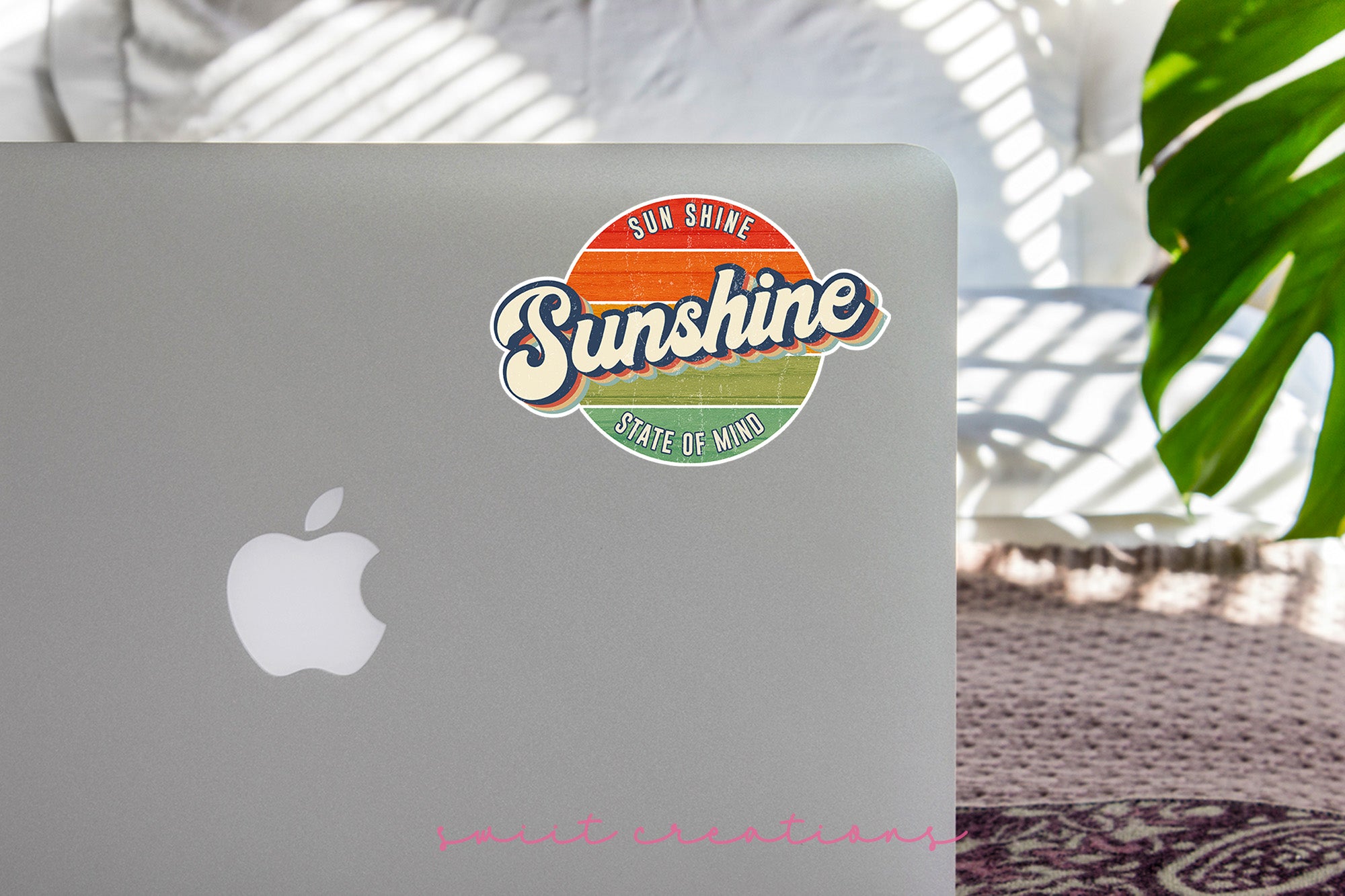 a laptop computer sitting on top of a table