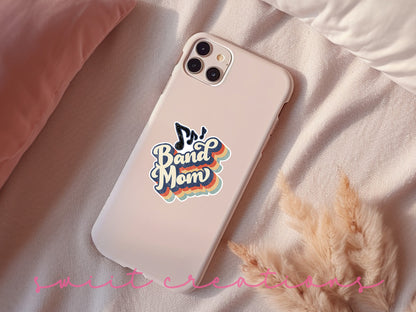 a phone case sitting on top of a bed