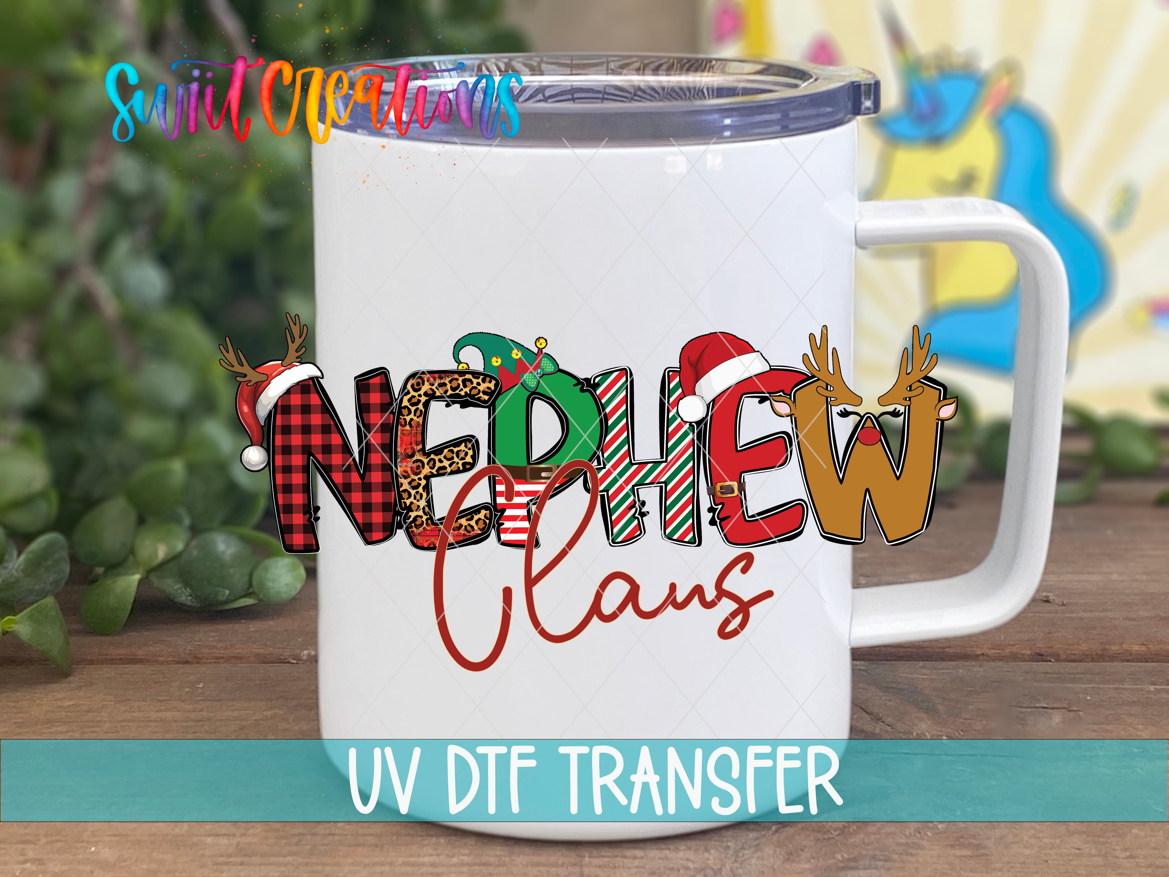 A white mug with a colorful design featuring the text "NEDDIE CLANS" and various holiday-themed elements such as reindeer, snowmen, and Christmas trees.