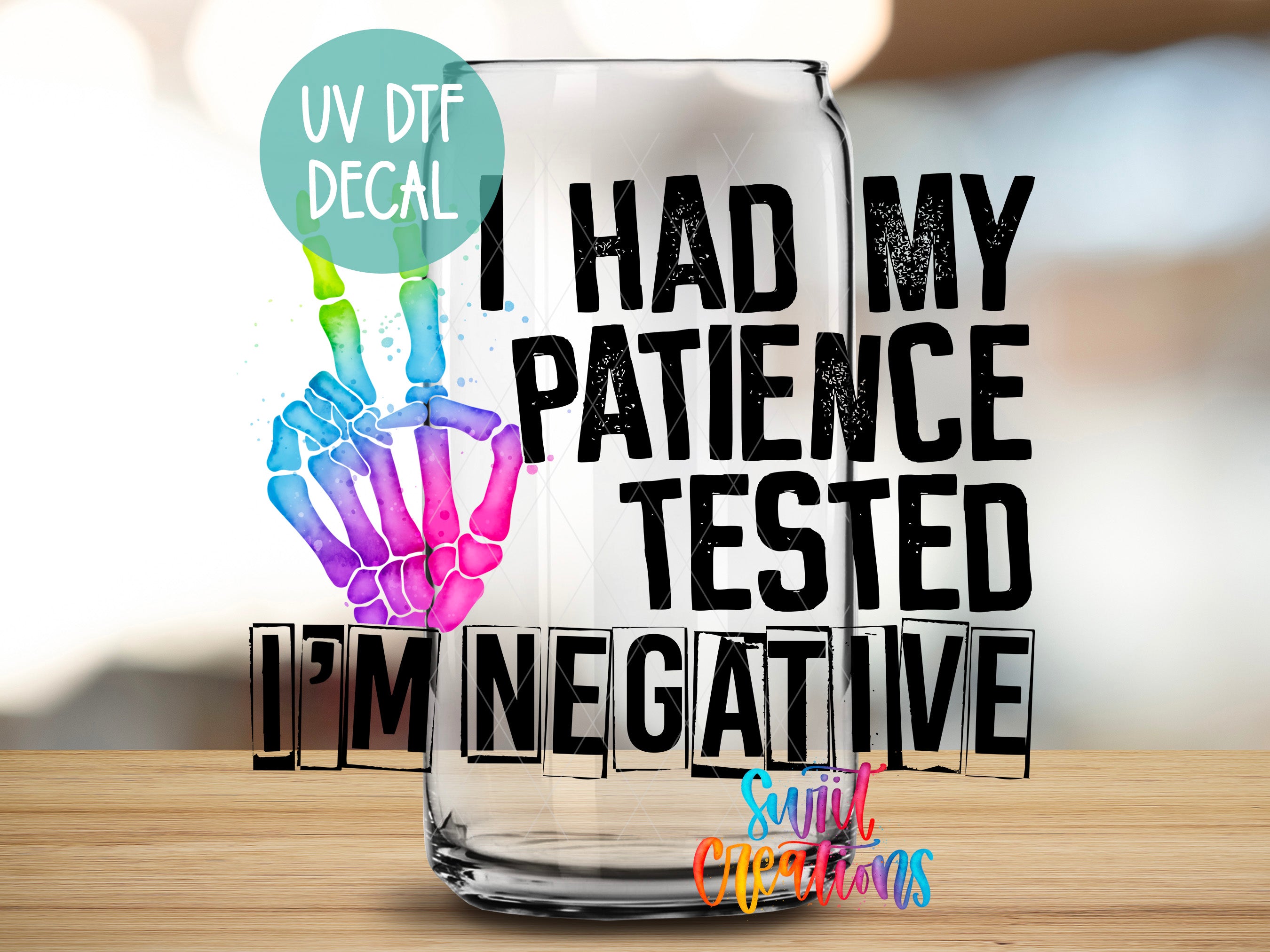 a glass that has a hand and a balloon on it