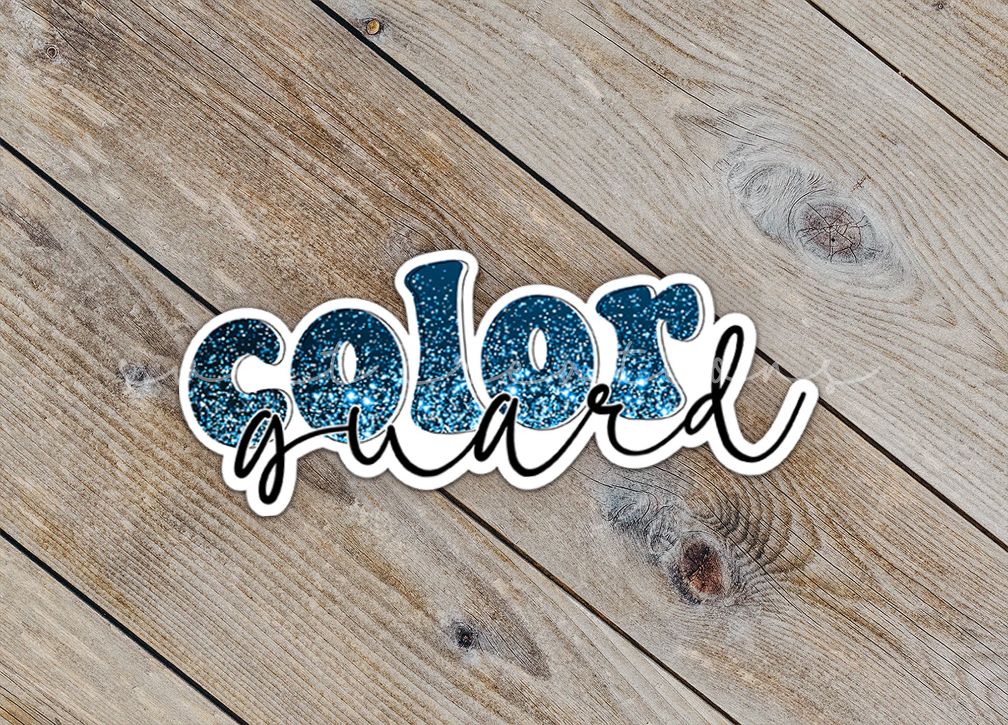 a close up of the word color on a wooden surface