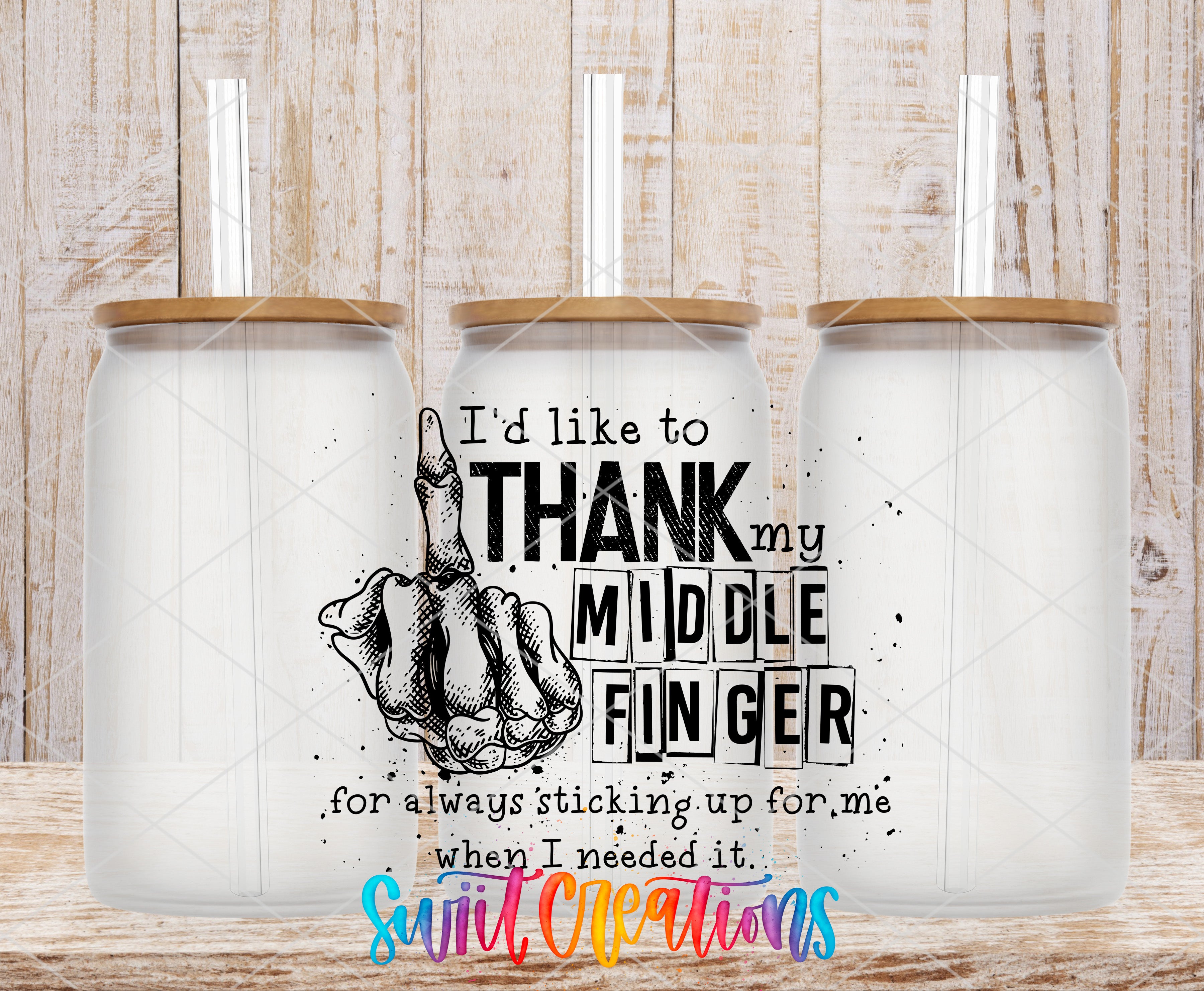 three glass jars with lids, each containing a straw. The jars are arranged in a row, and there is a text overlay on the jars that reads "I'd like to THANK my MIDDLE FINGER for always sticking up for me when I needed it."