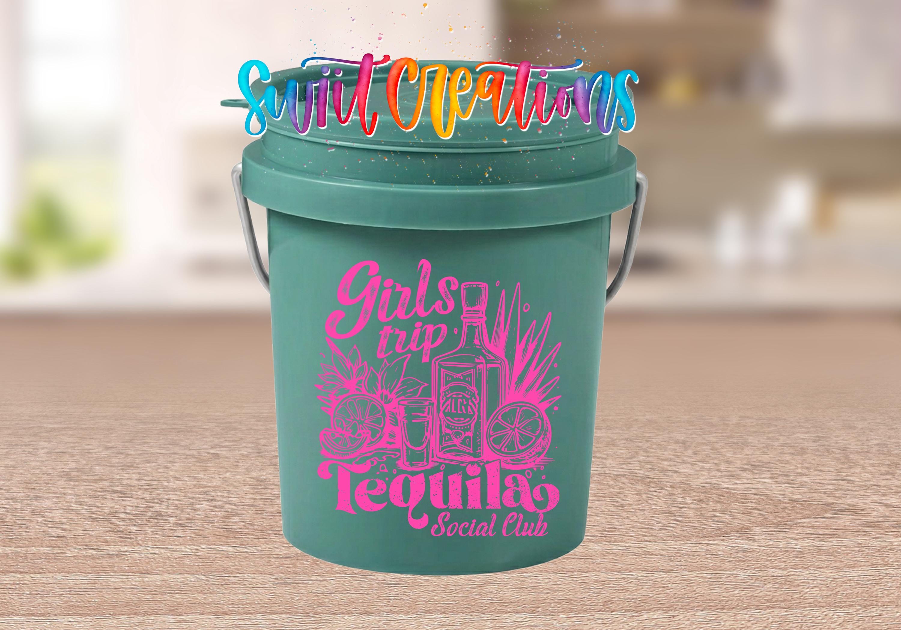 A green bucket with a tequila-themed design and text, including the words "Girls trip Tequila" and "Girls trip social club".
