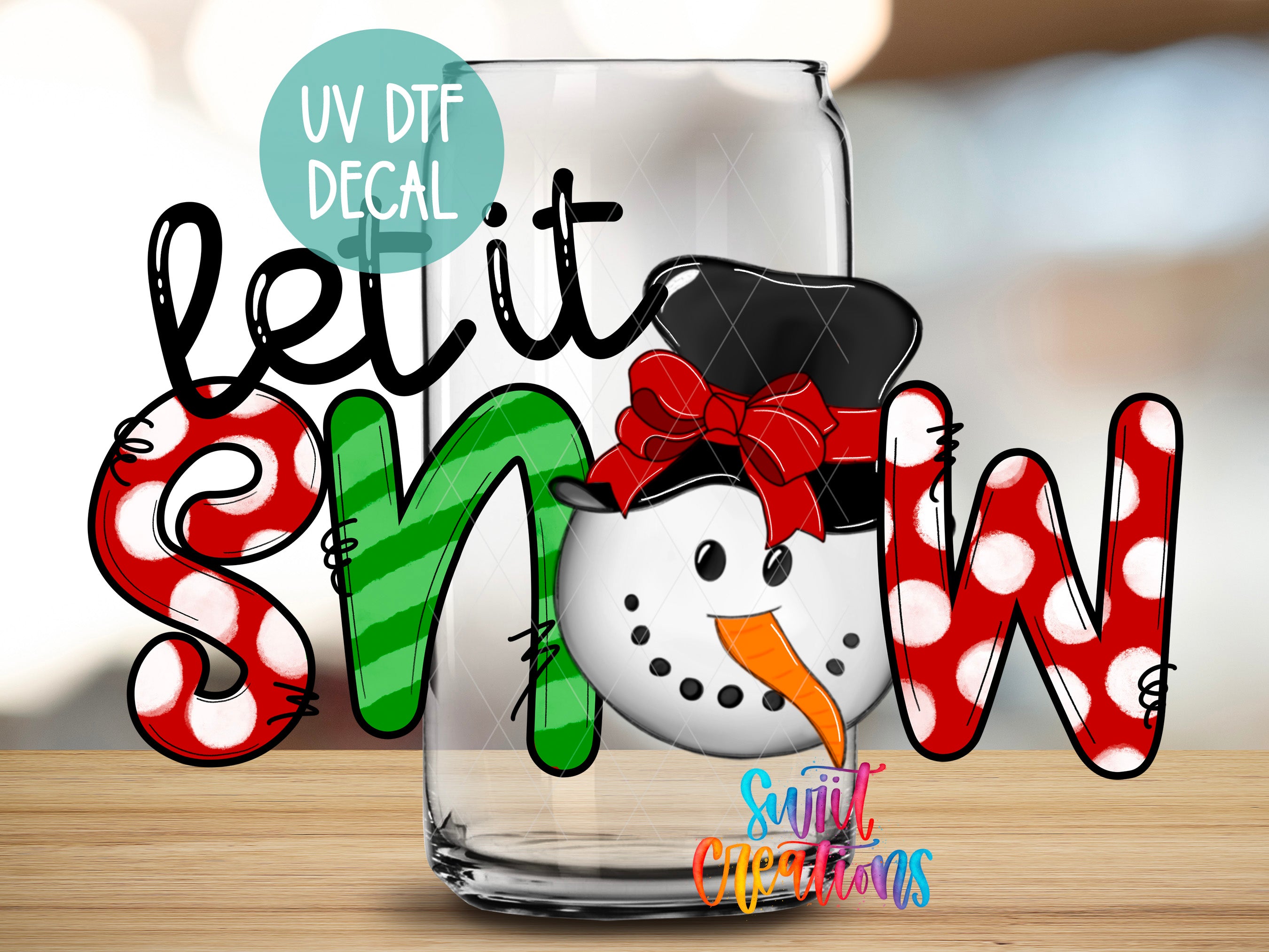 a glass with a snowman in a top hat