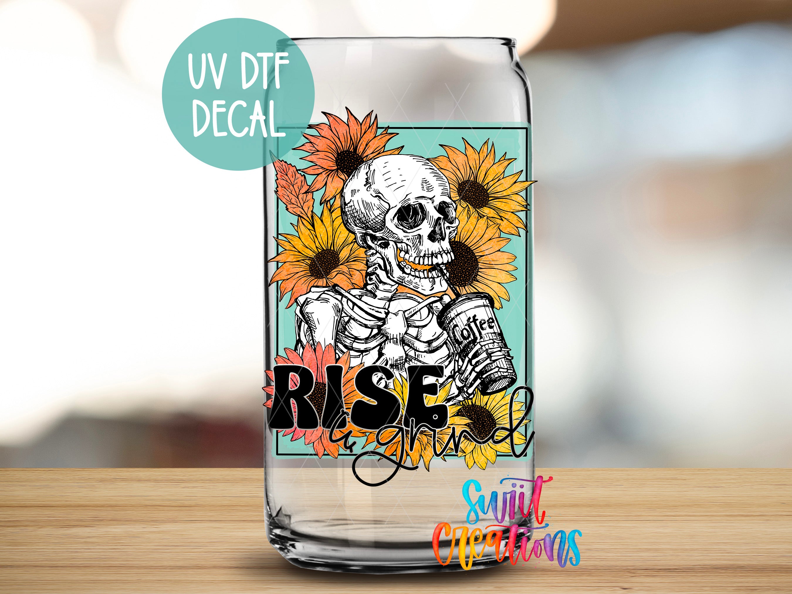 a glass with a picture of a skeleton and sunflowers