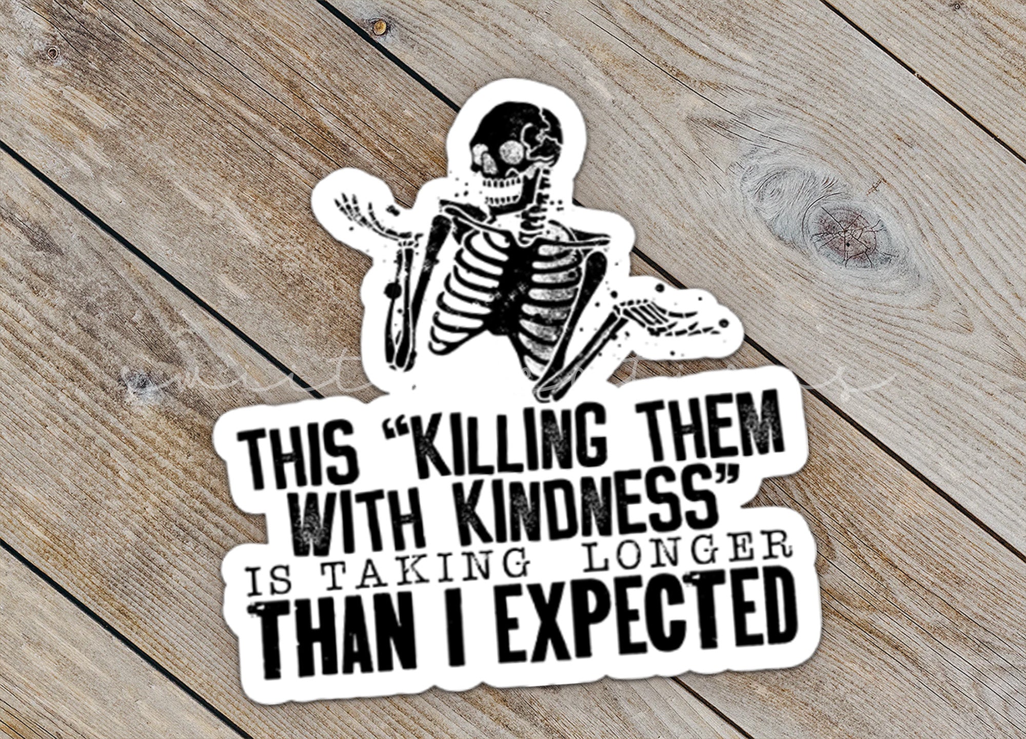 a sticker that says, this killing them with kindness is taking longer than i