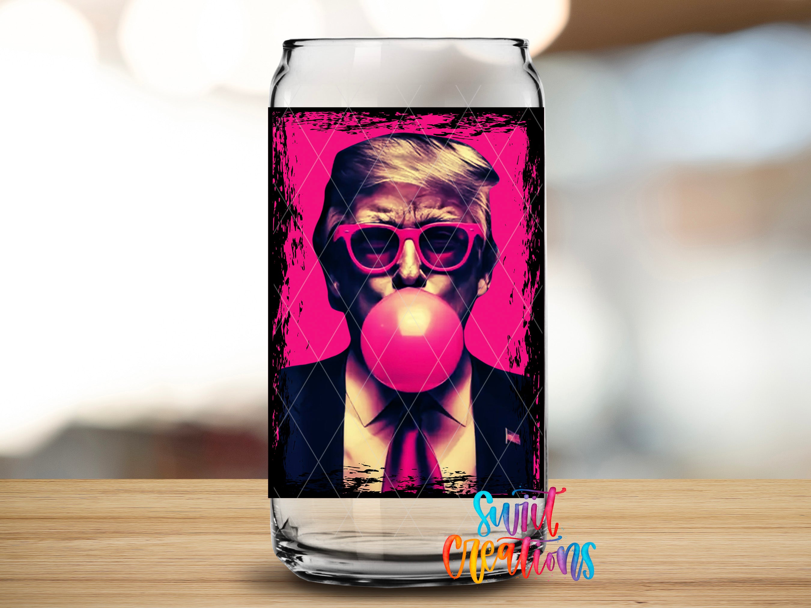 A glass can with a printed image of a man blowing a bubble with a pink bubblegum bubble.